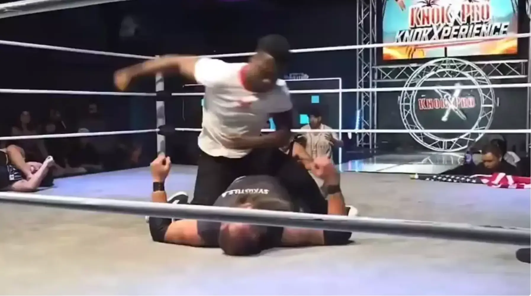 Raja Jackson appeared to attack Stuart Smith after taking him down in the wrestling ring (X)
