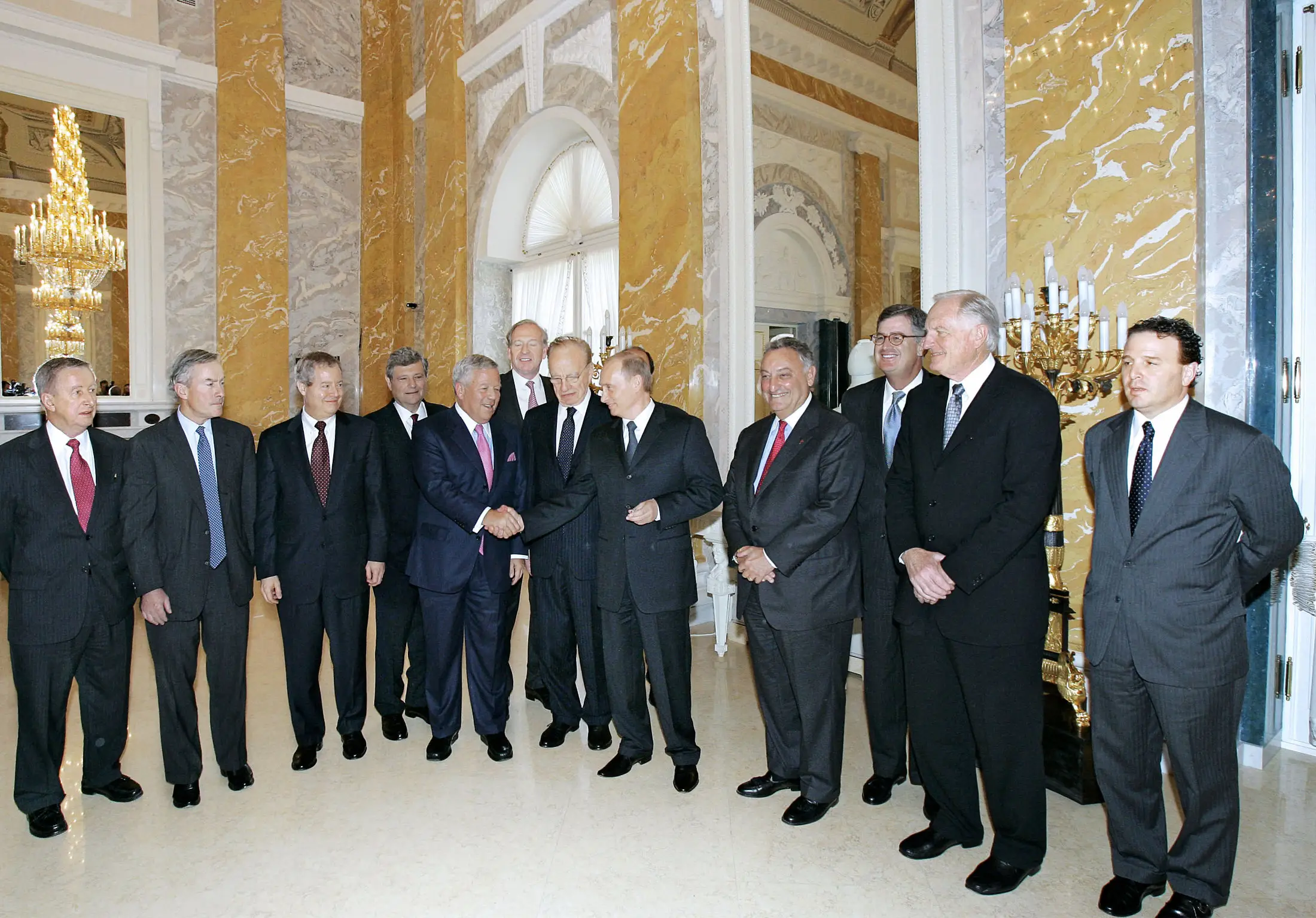 Vladimir Putin and Robert Kraft seen together, centre left (ALEXANDER NIKOLAYEV/AFP via Getty Images)