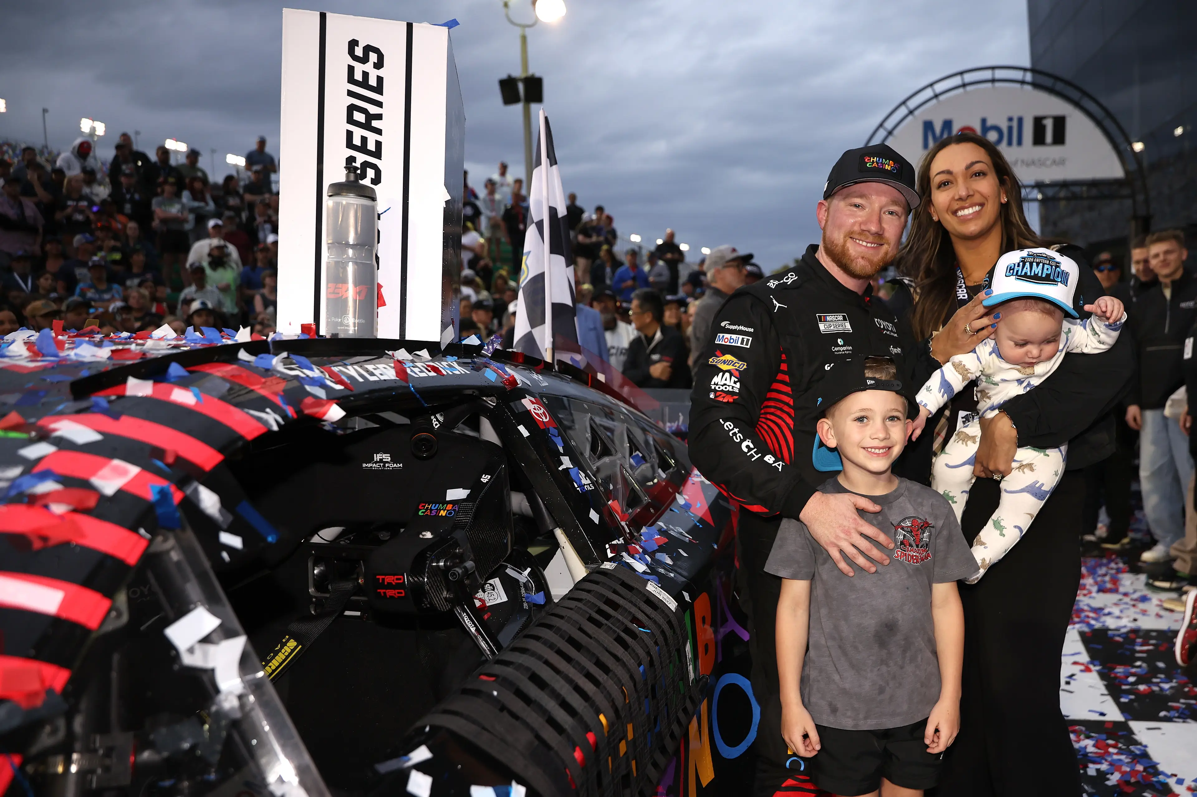 The Daytona 500 champ seen with his wife Alexa De Leon and their sons, Beau and 9-month-old Rookie (James Gilbert/Getty Images)