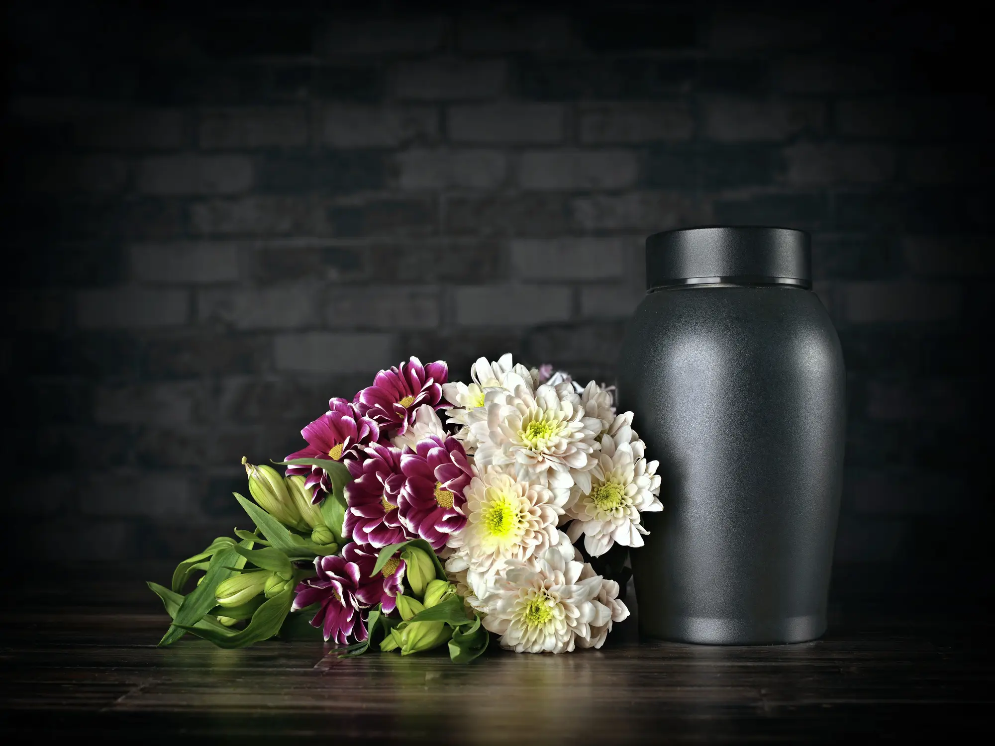 Ashes are gathered with a rake before being given to the family of the deceased (Getty Stock Image)