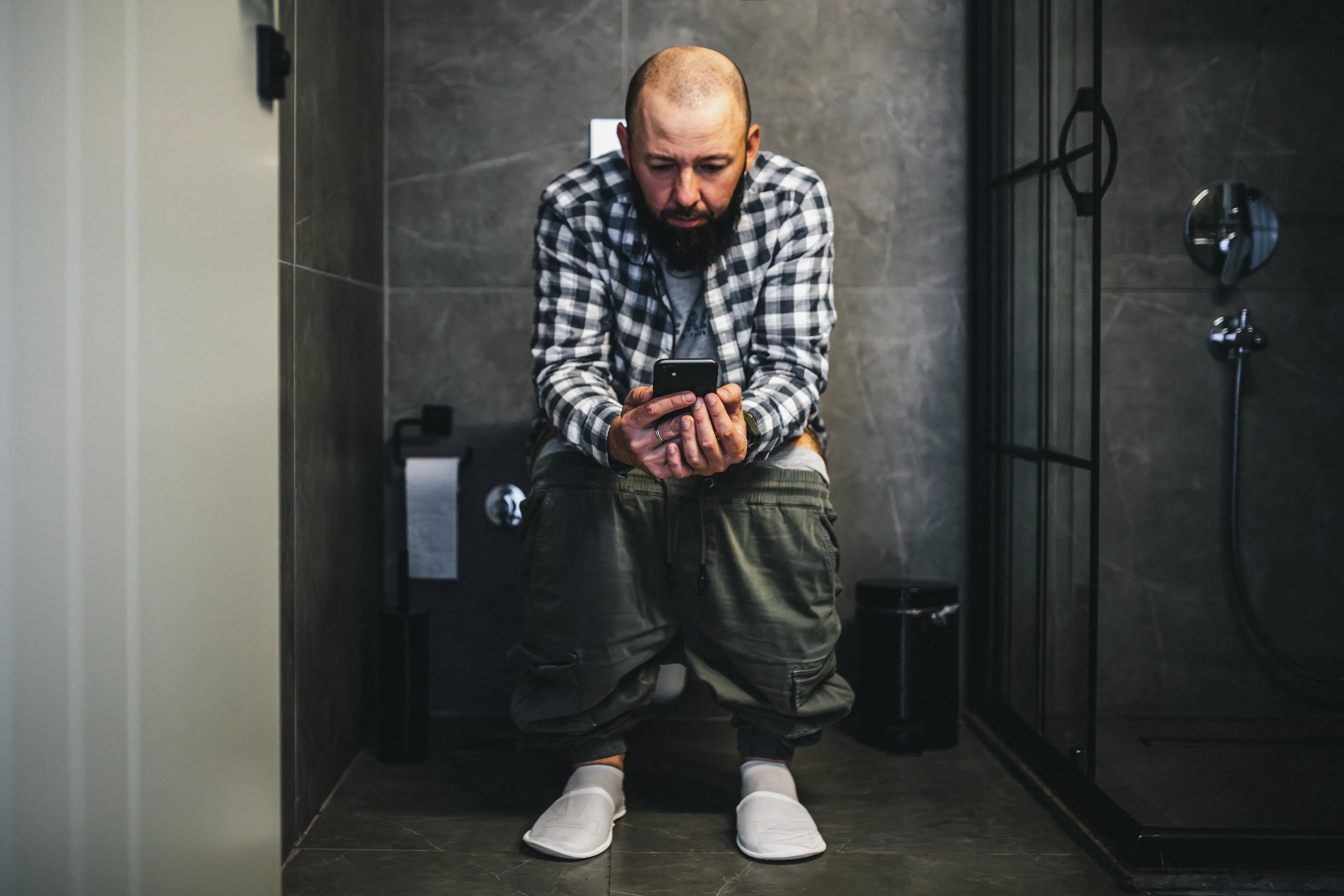 Prolonged sitting on the toilet can lead to some unfortunate health problems (Getty Stock Image)