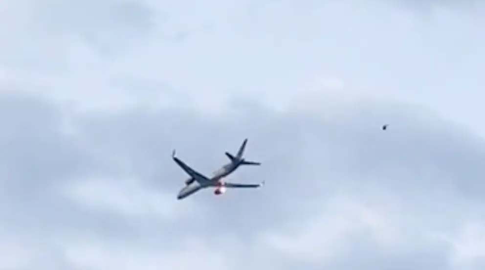 Part of the plane burst into flames for those on the ground to see (Viral Press)