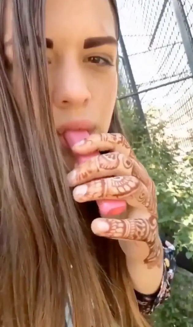 The 24-year-old routinely took puffs of the e-cigarette herself before passing it back to the primate (X)