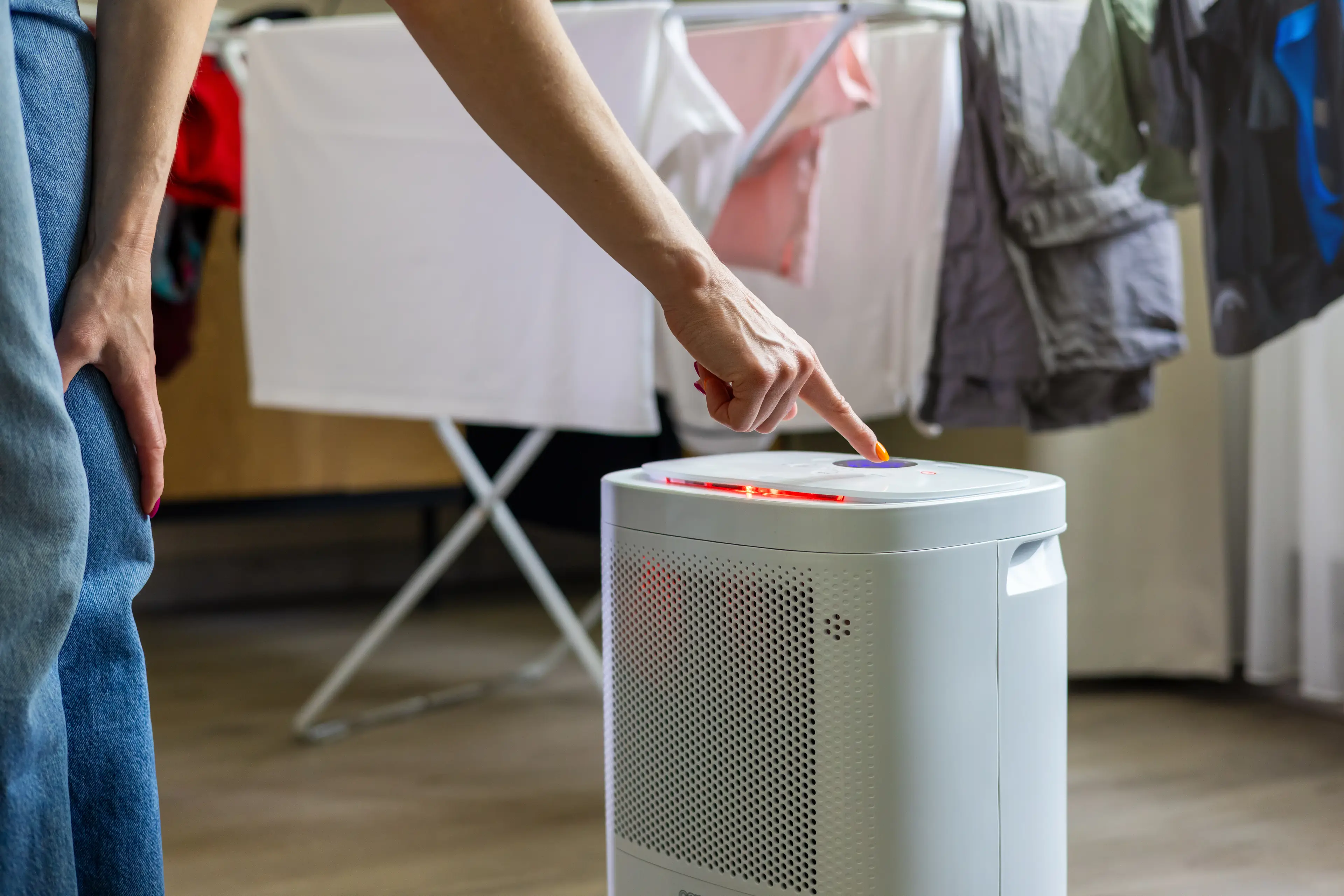 Removing humidity from the room makes it quicker to heat your home and dry your clothes (Ronstik via Getty Images)