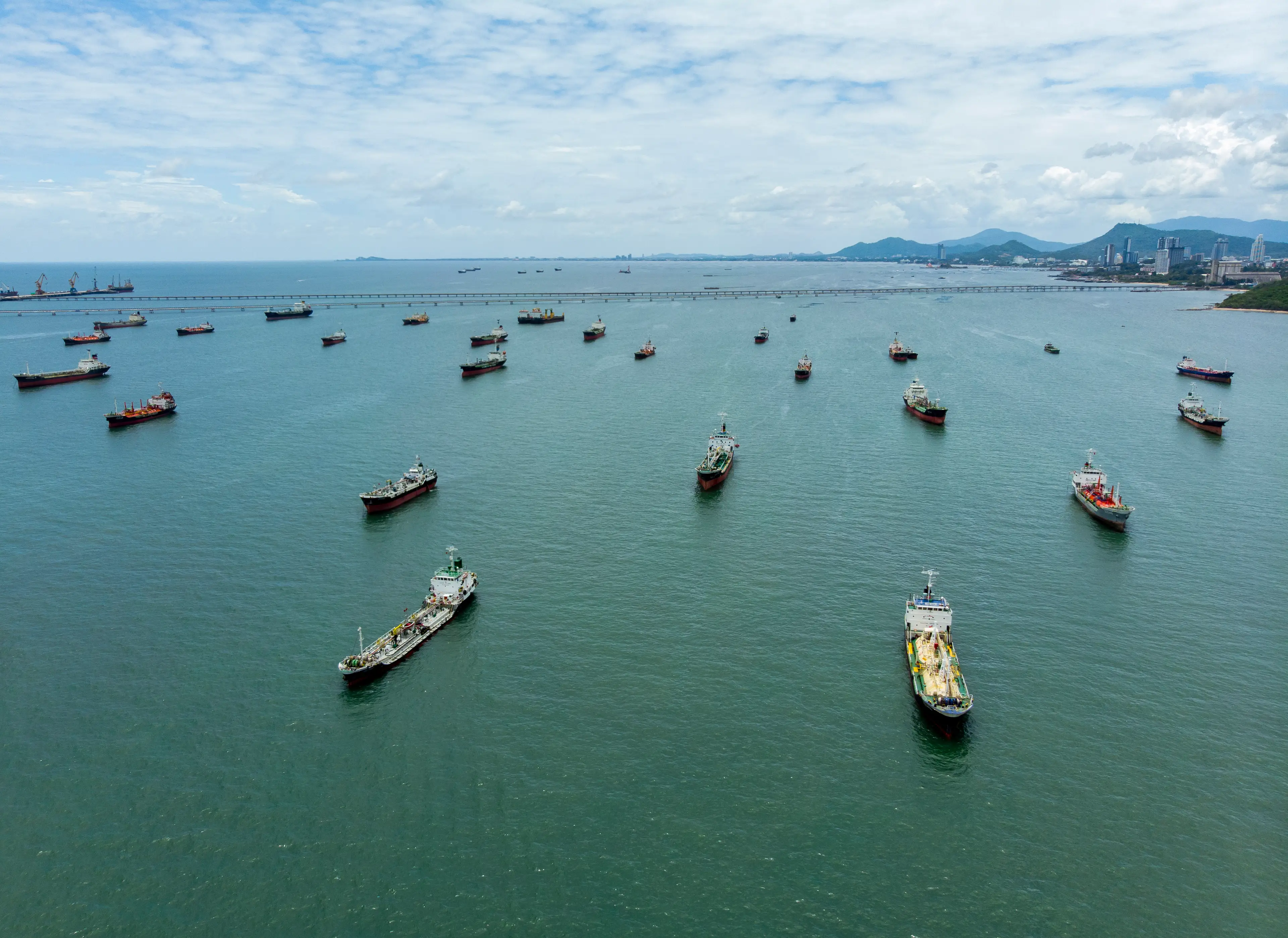 Oil tankers and gas tankers sat waiting to move through the Strait of Hormuz (Getty)