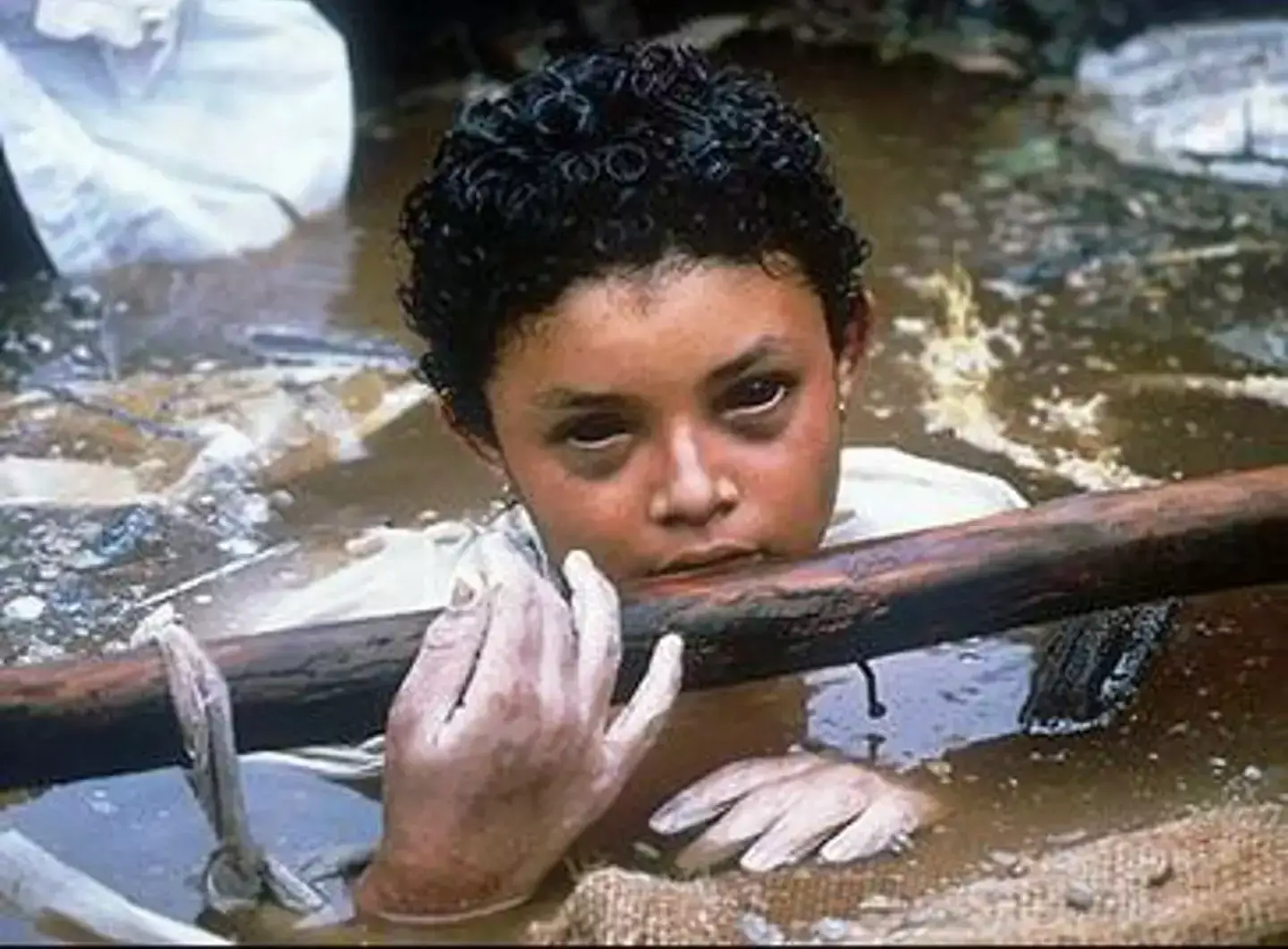 The little girl in the haunting image has been seen across the world (Wikimedia Commons/Frank Fournier)