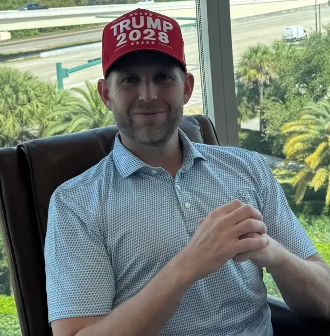 The President's son Eric was seen modelling a cap from the new range (Trump Store)