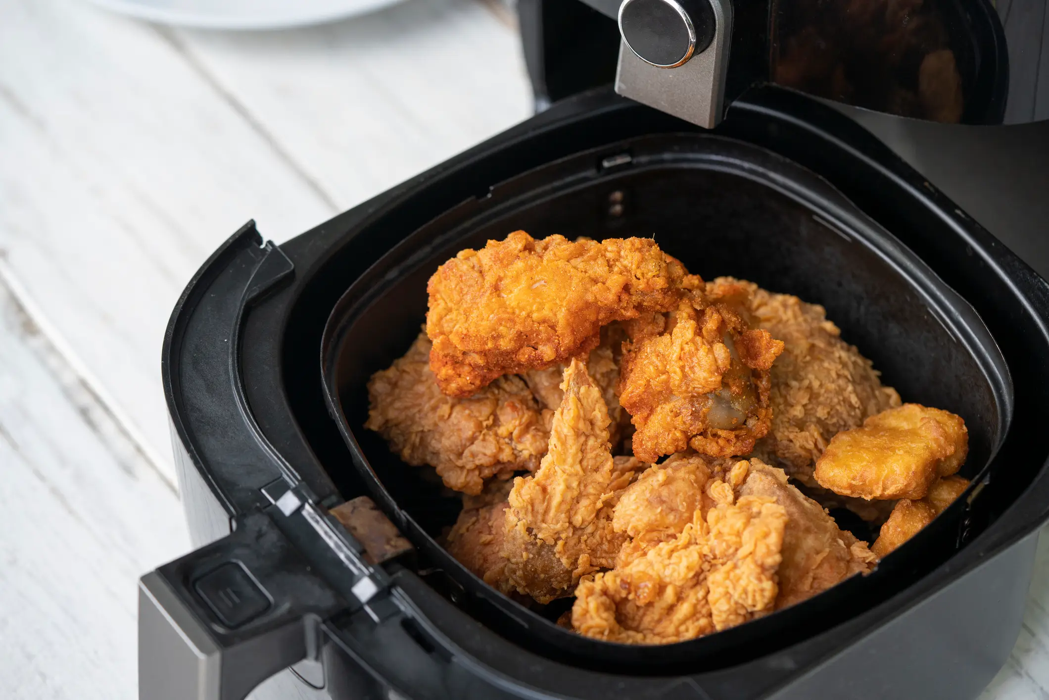 It's likely that almost everyone you know has an air fryer (Getty Stock Image)