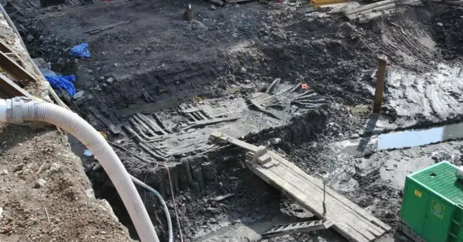 In 2010, when construction workers were rebuilding the site, they stumbled upon an old wooden ship.