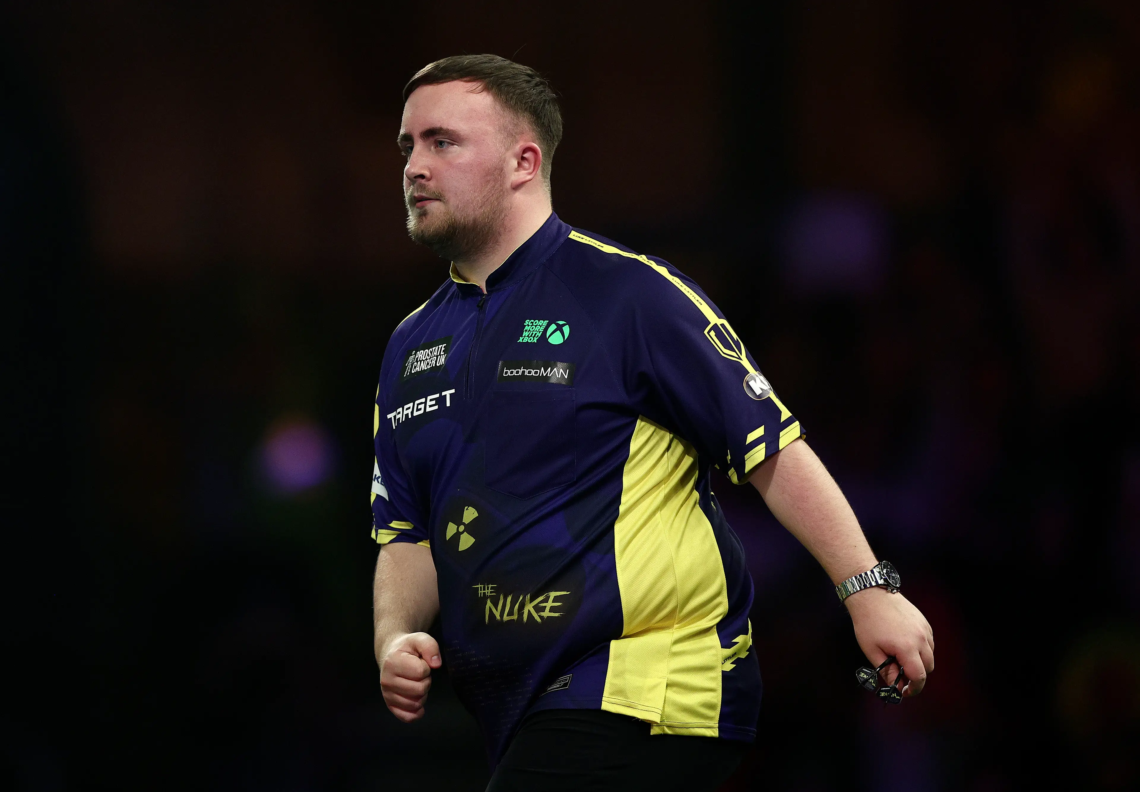 Luke Littler defeated Nathan Aspinall to make it to the semi finals. (James Fearn/Getty Images)