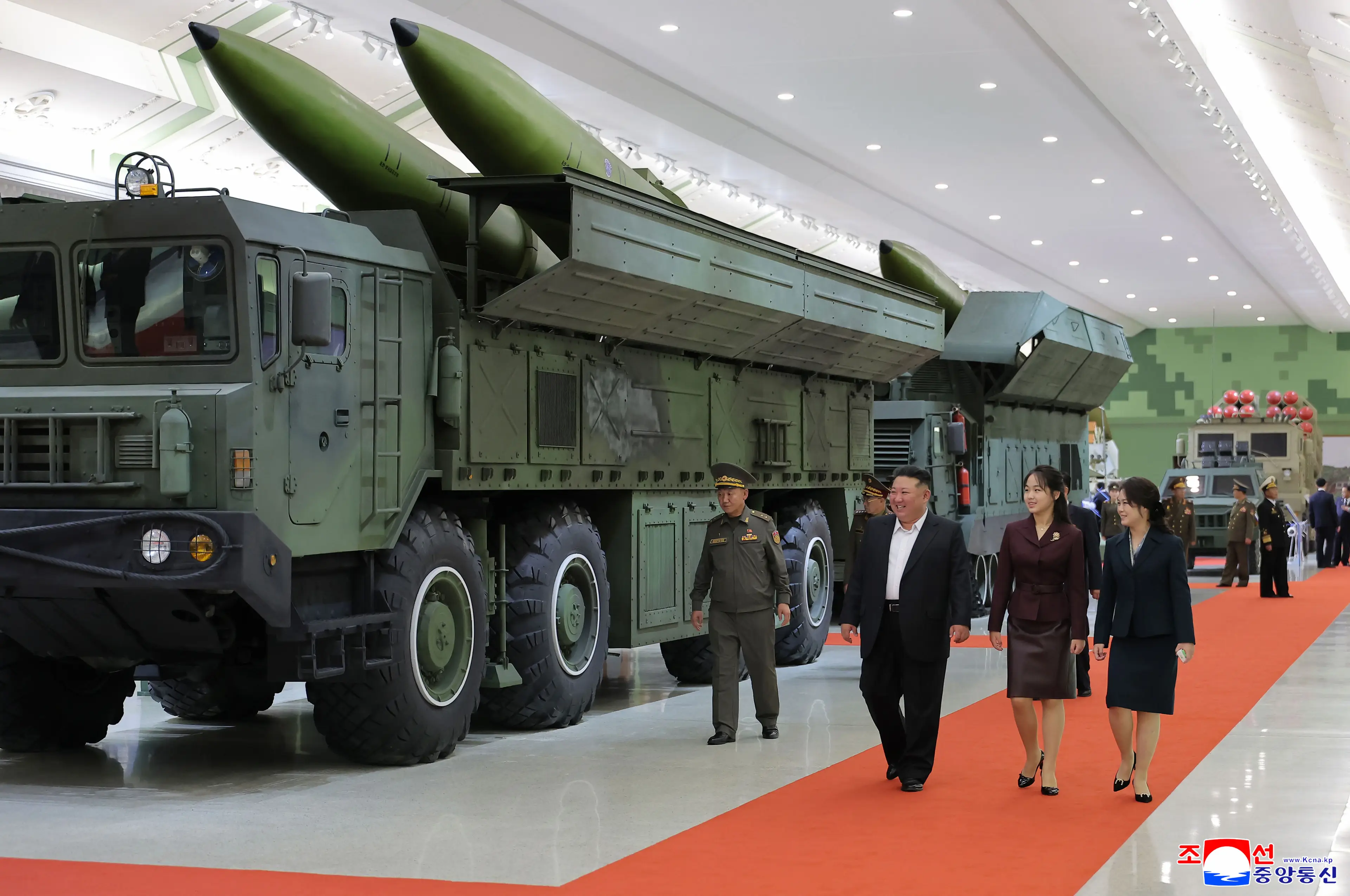Kim Jong Un pictured with his wife and their daughter at the National Defence Revolution Museum in North Korea earlier this month (AP/PA Images)