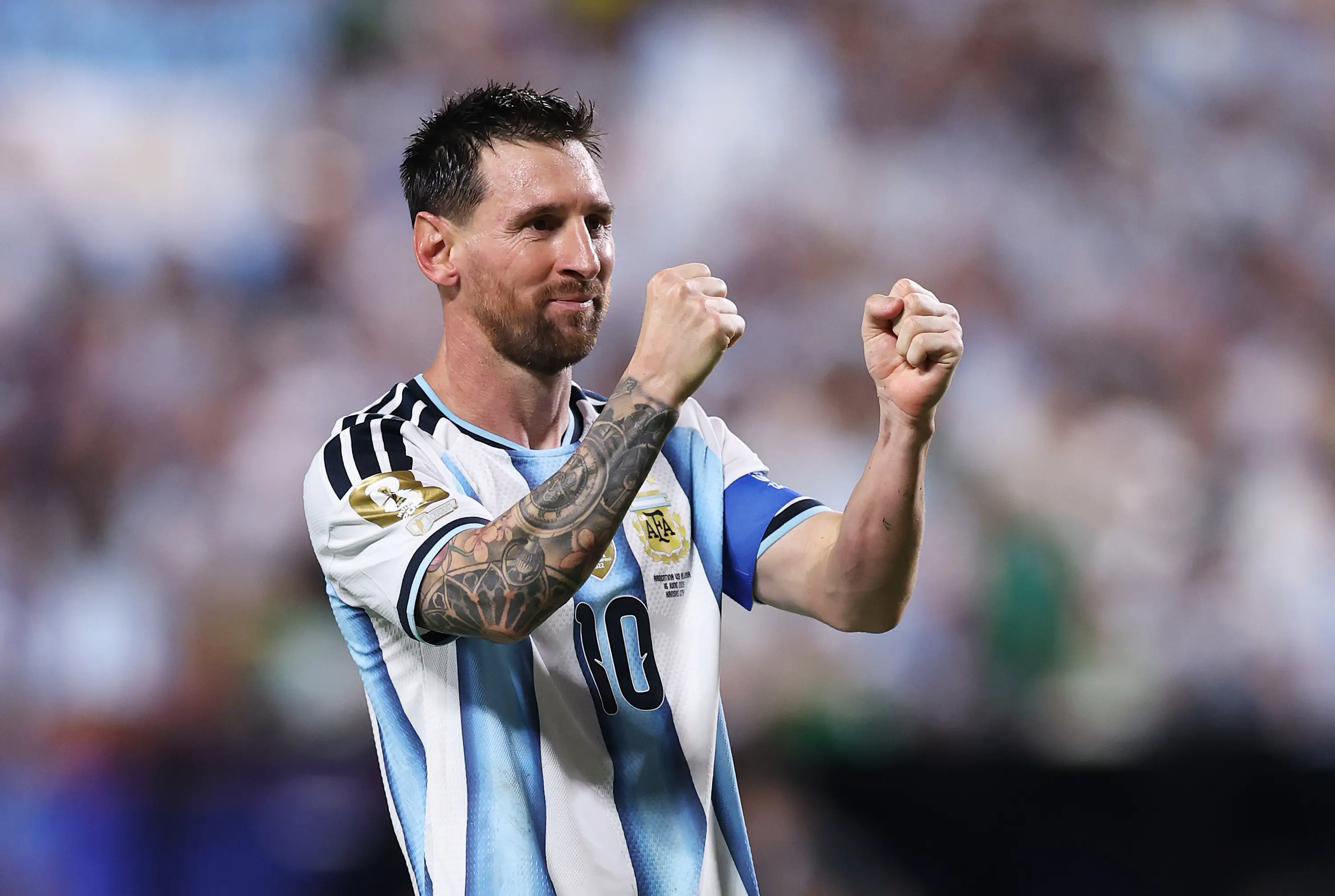 Lionel Messi celebrates his hat-trick. (Michael Steele/Getty Images)