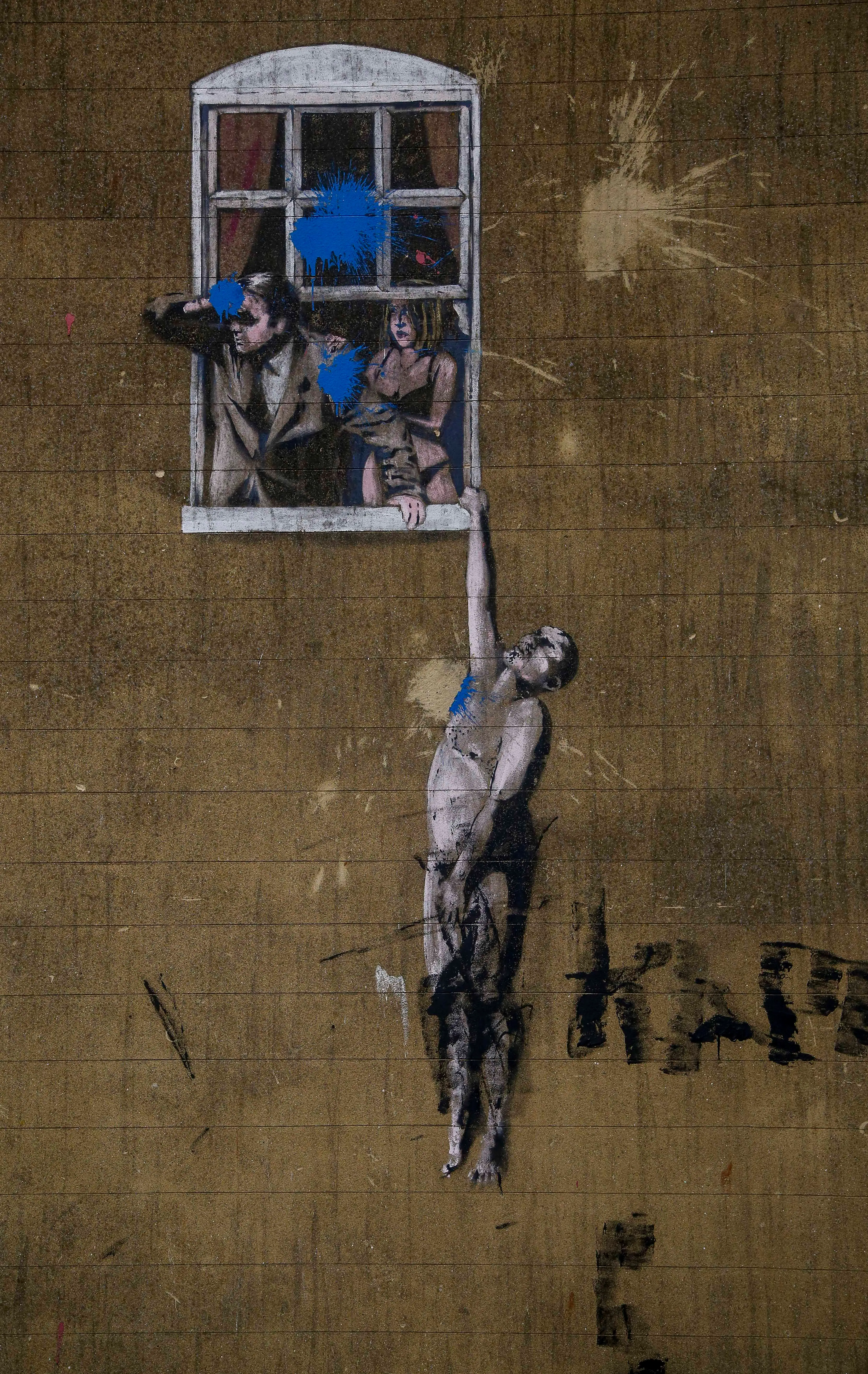 It is close to the elusive spray painter's 'Well Hung Lover' piece in Bristol.