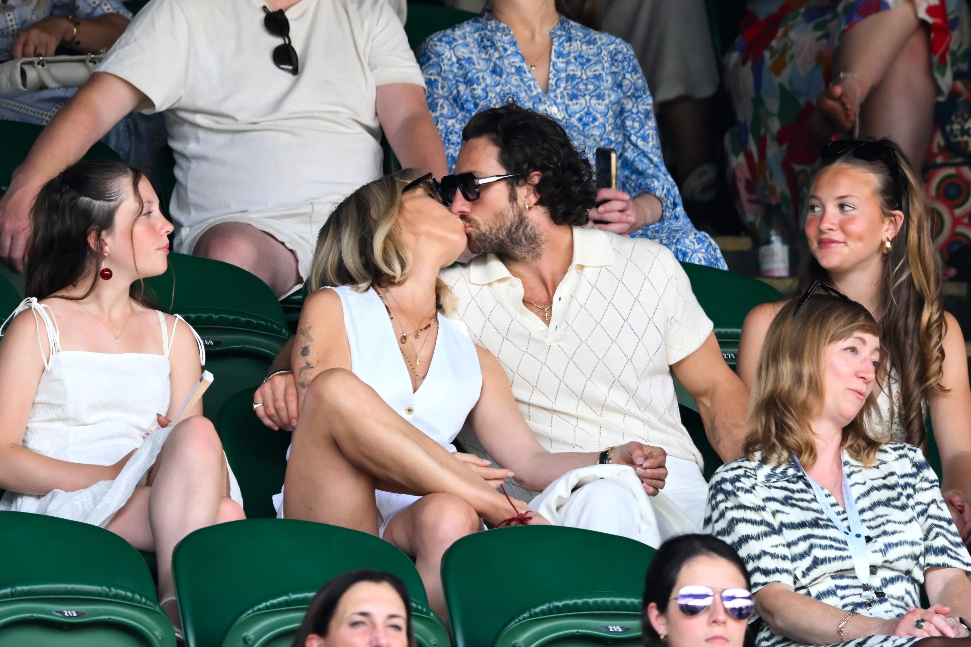 They shared a smooch in the stands at Wimbledon (Karwai Tang/WireImage)