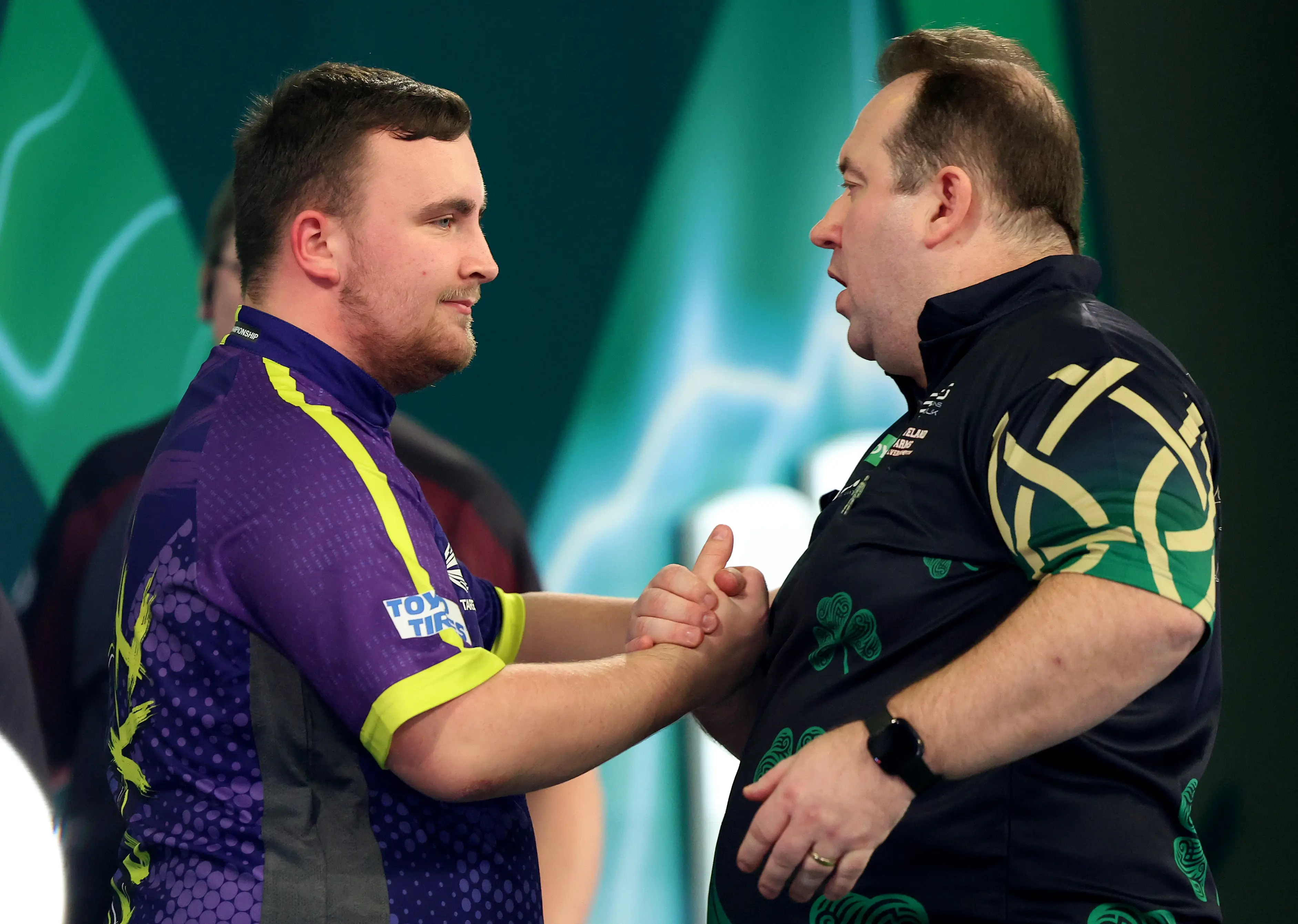 Luke Littler and Brendan Dolan at the quarter final.