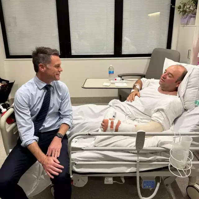 NSW premier Chris Minns visited Ahmed al Ahmed in hospital and called him a 'hero' (X/@ChrisMinnsMP)