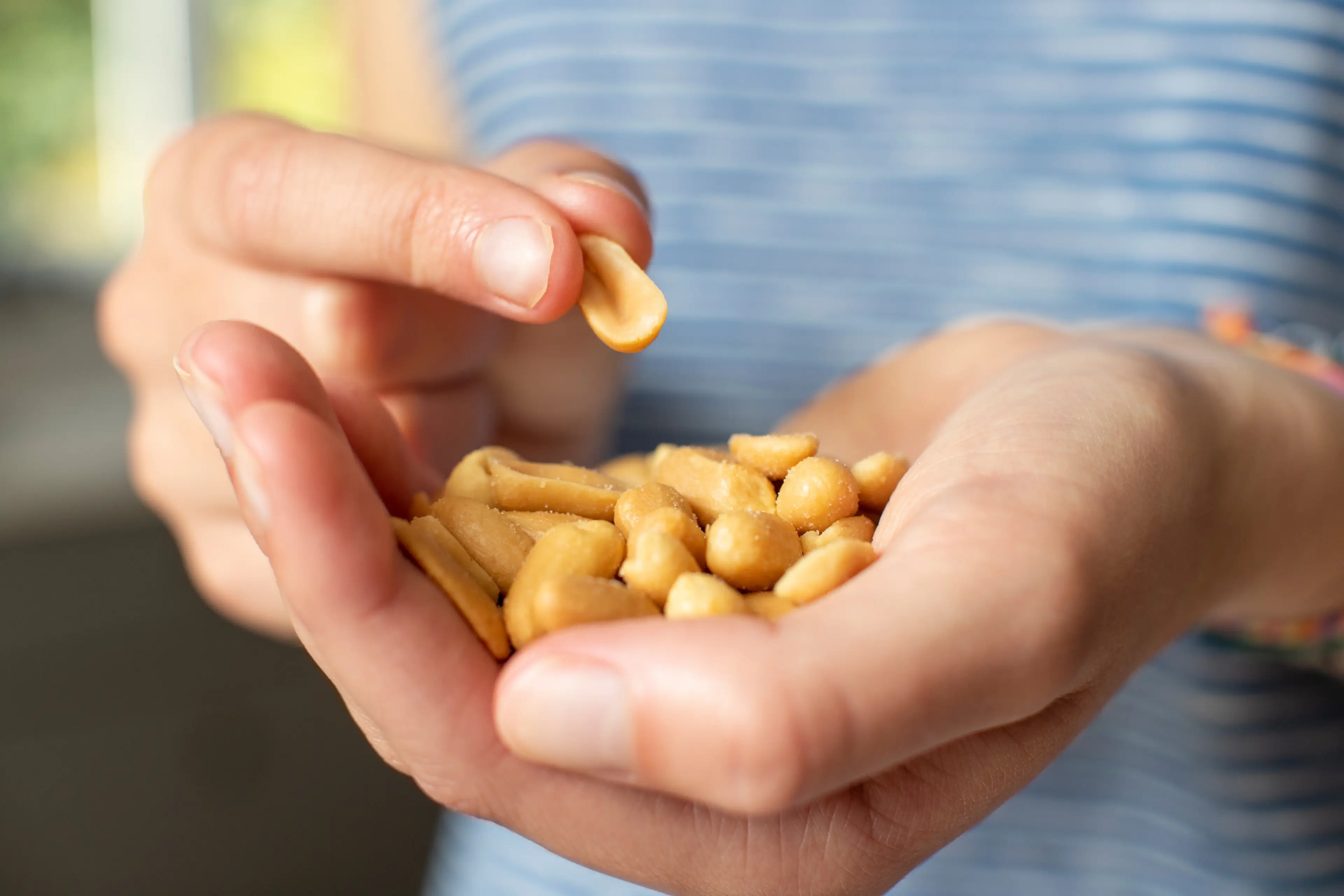 He compares popping four peanuts a day to 'taking his medicine' (Getty Stock Photo)