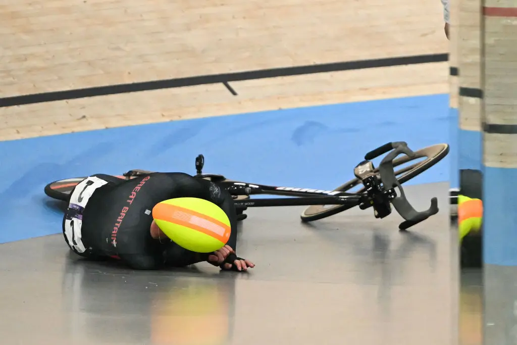 The crash left Team GB's Oliver Wood sprawled out across the track. (SEBASTIEN BOZON/AFP via Getty Images)