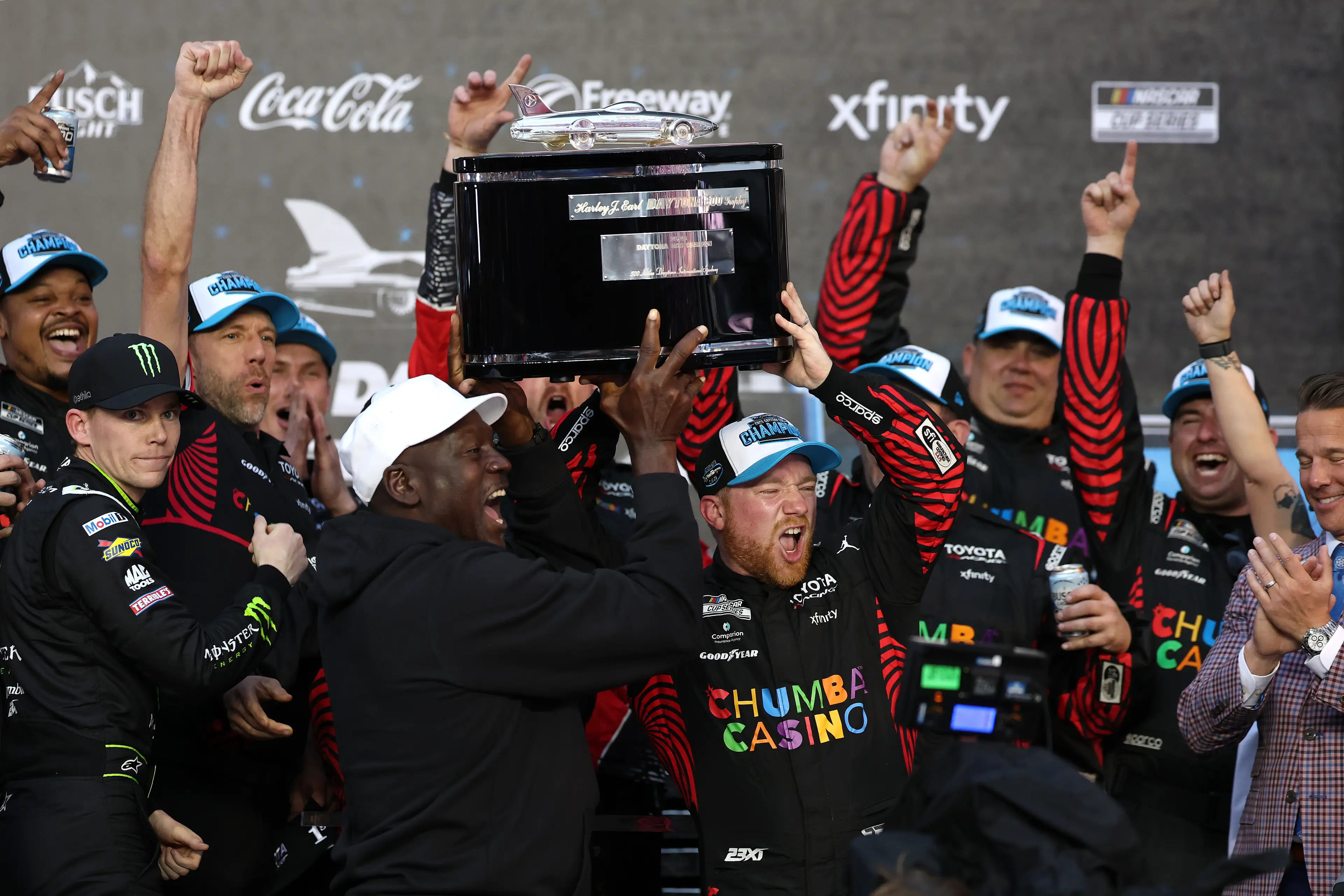 Reddick and Jordan seen celebrating his Daytona 500 win on Sunday (Photo by Chris Graythen/Getty Images)