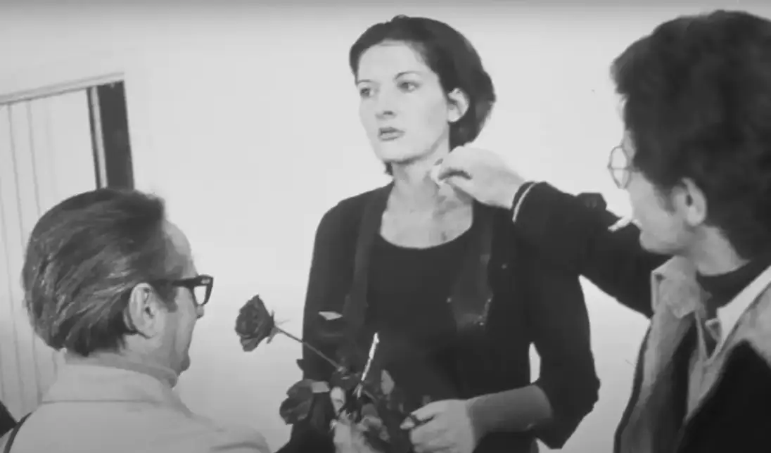 Marina Abramović performing 'Rhythm 0' (YouTube/Marina Abramović Institute)