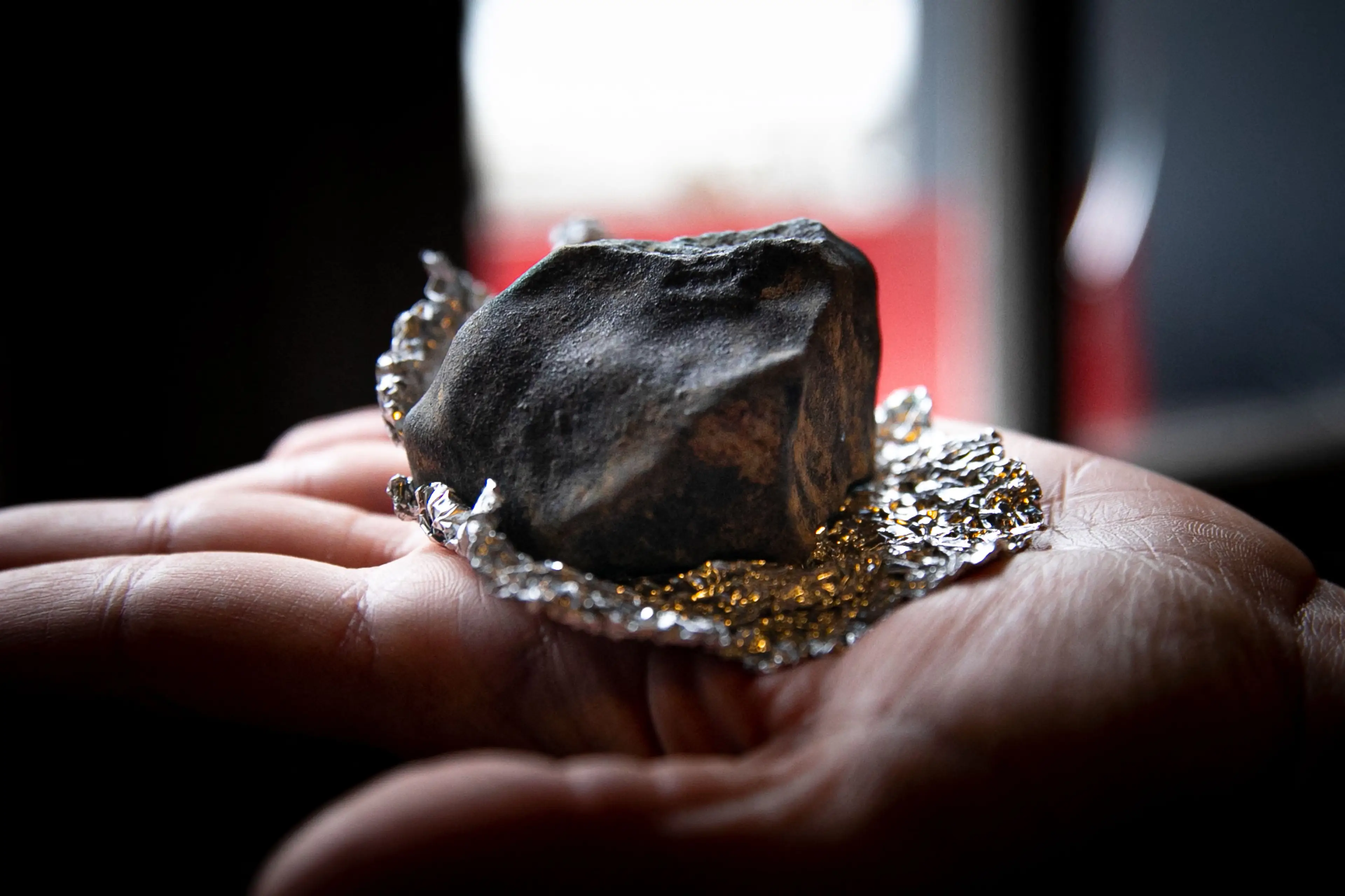 A meteorite found on the ground from 2023 CX1 (LOU BENOIST/AFP via Getty Images)