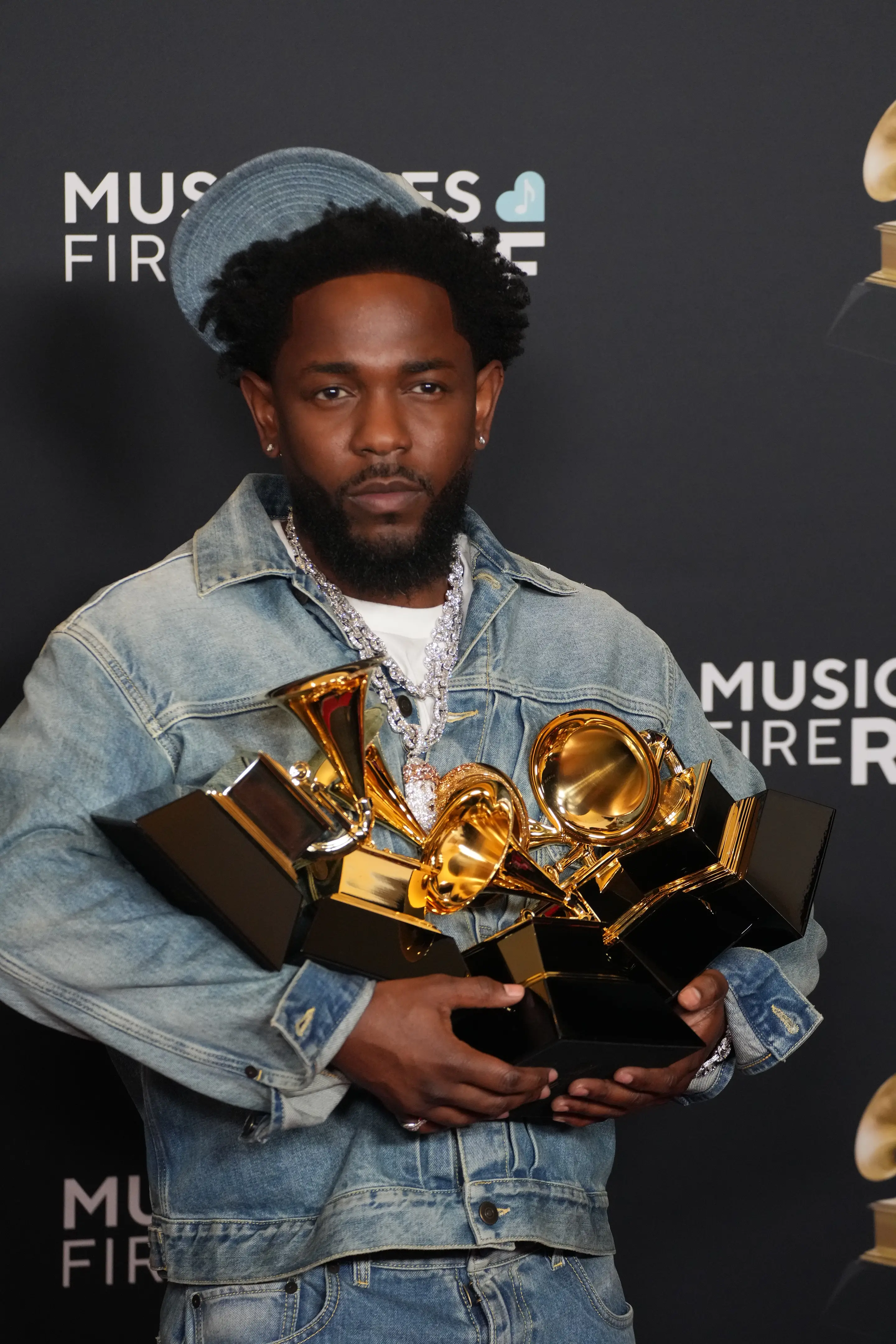 Kendrick Lamar with his five Grammy wins (Jeff Kravitz/FilmMagic)
