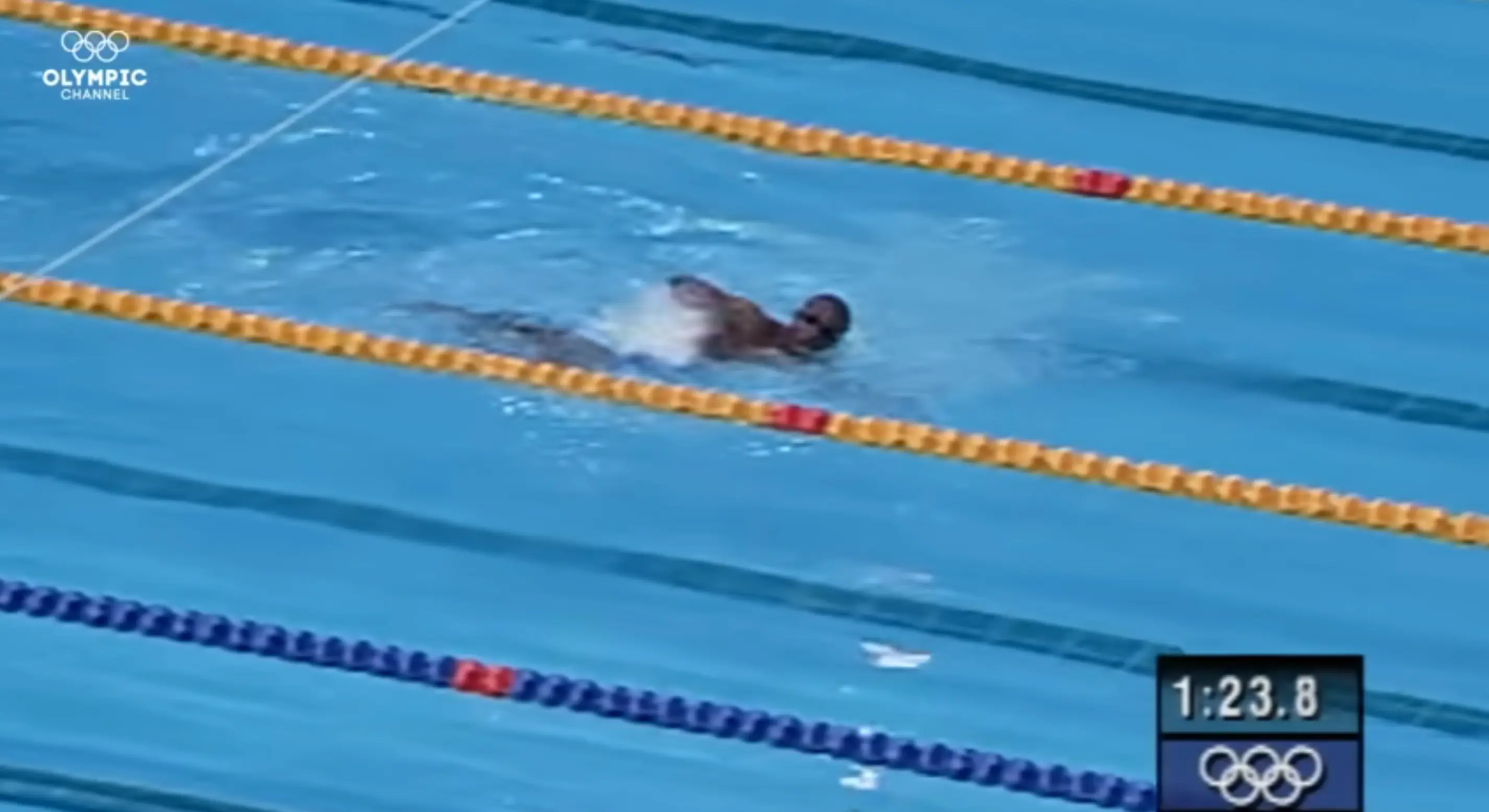 Moussambani was cheered on by the crowd to finish. (YouTube/Olympics)