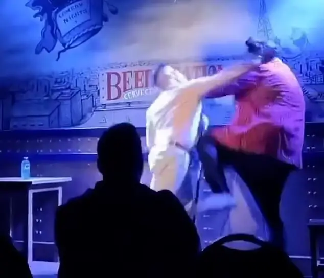 Comedian Jaime Caravaca took a few blows in front of the crowd (TrimFeed via YouTube)