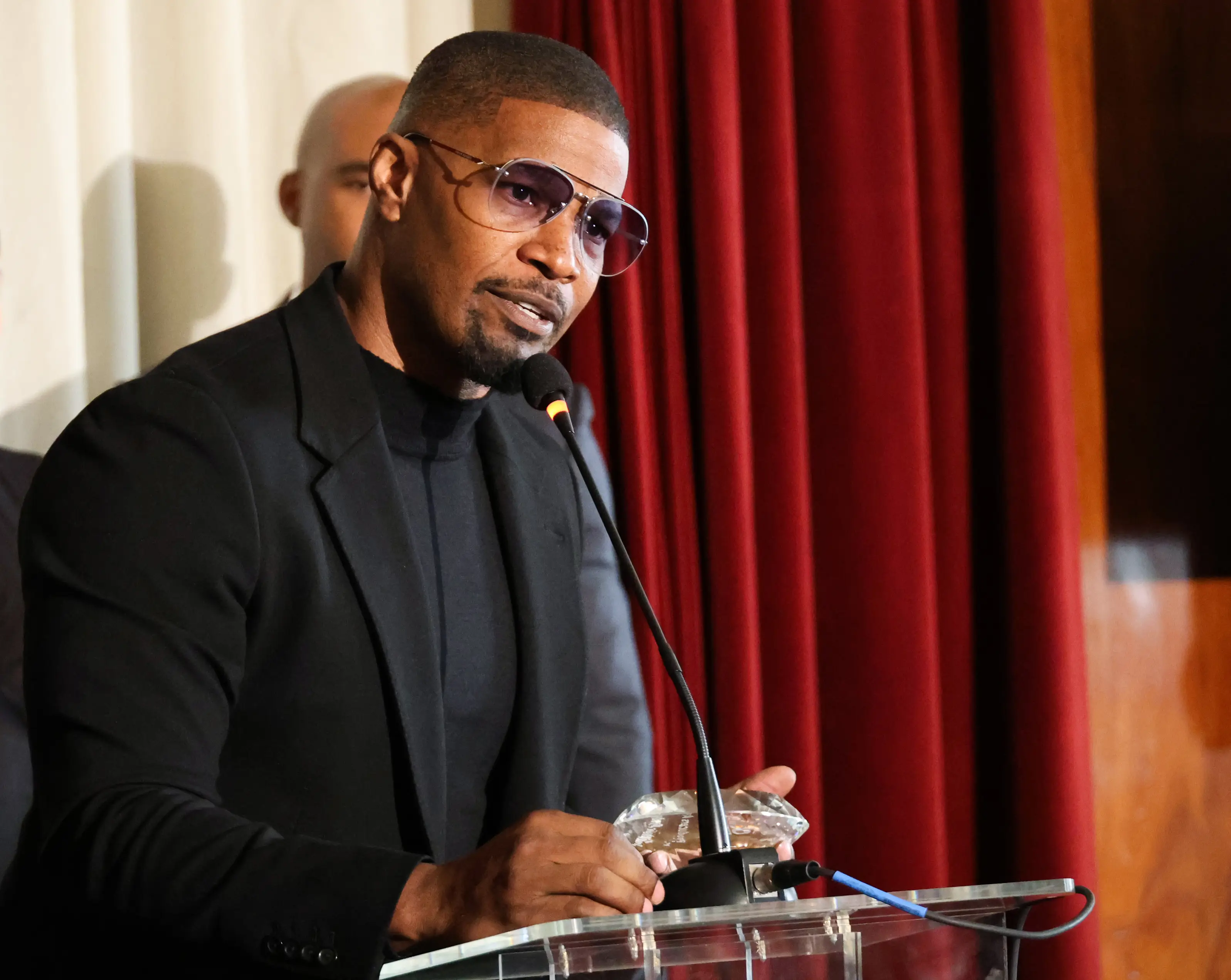 Jamie Foxx told the audience at the AAFCA that he'll open up about his situation soon. (Kayla Oaddams/Getty Images)