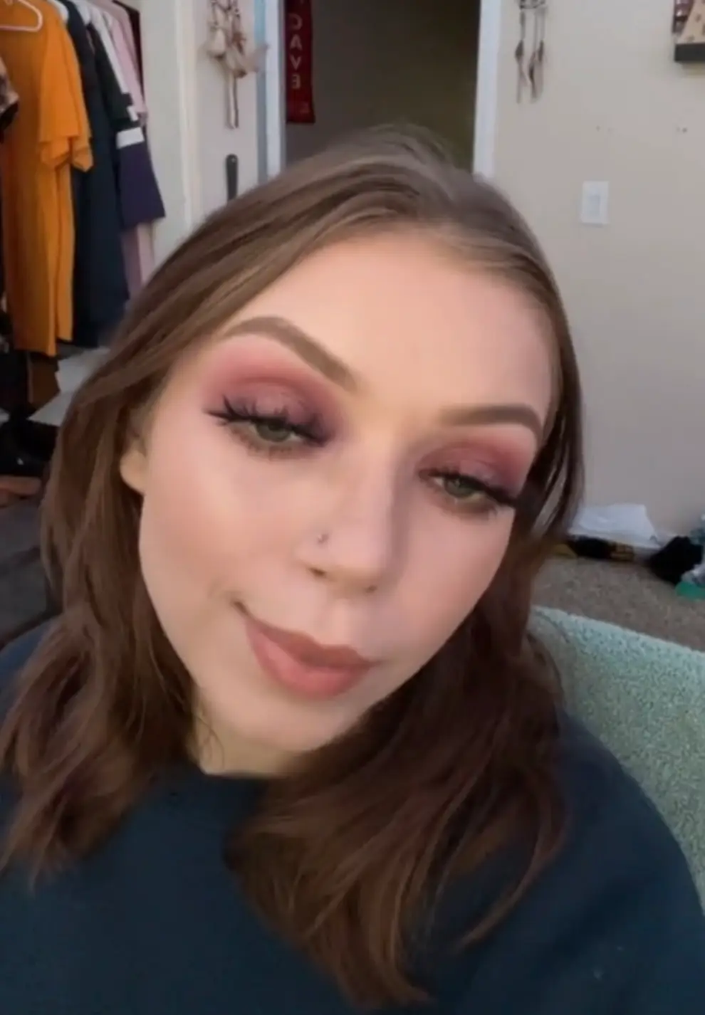 Aida Burkins, 22, said medics initially believed it was 'just altitude sickness' (TikTok/@moody.aidaa)