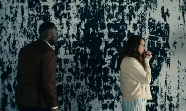 The painting appears to be glitching later in the film.