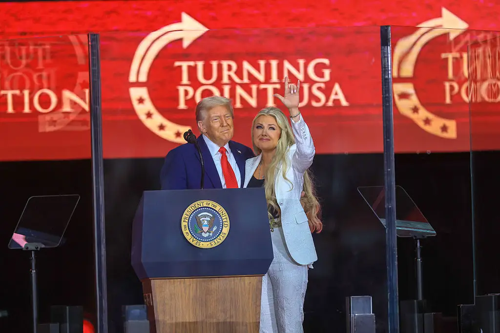 Erika Kirk did the 'I love you' hand gesture at her husband's memorial service in Arizona at the weekend (Joe Raedle/Getty Images)