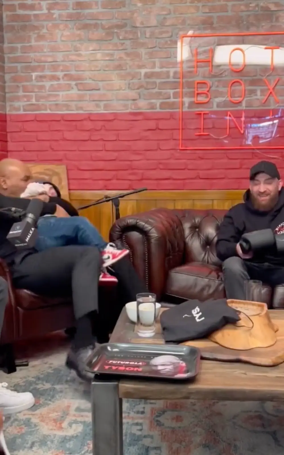 Tyson then pretend to nibble Hasbula's ear.