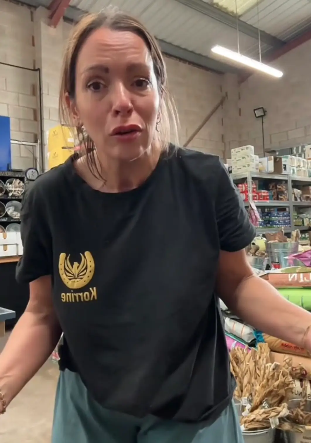 Korrine Pallas fought back tears as she responded to critics (TikTok/@equipaw_petsupplies)