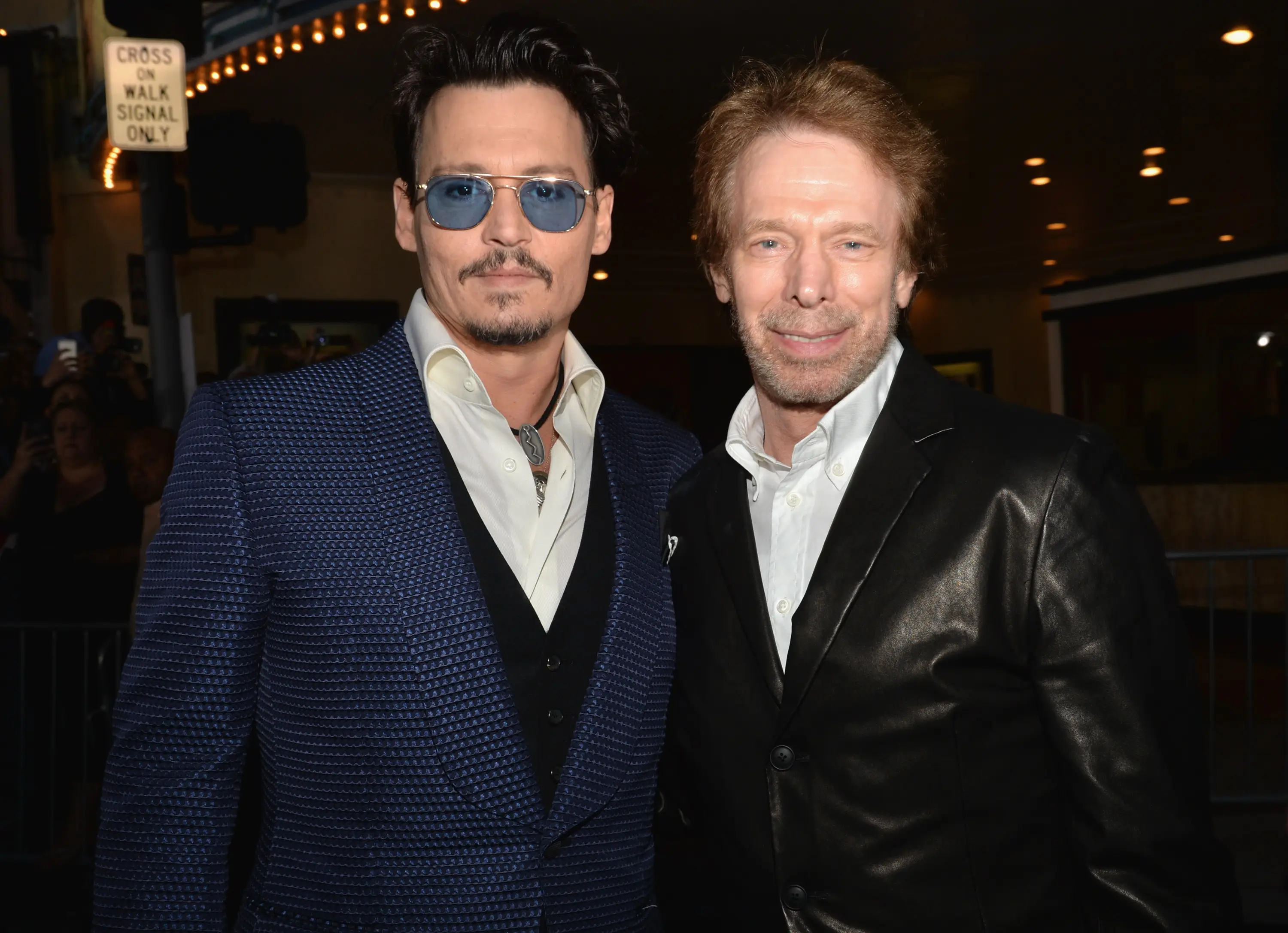 Jerry Bruckheimer and Johnny Depp (Lester Cohen via Getty Images)