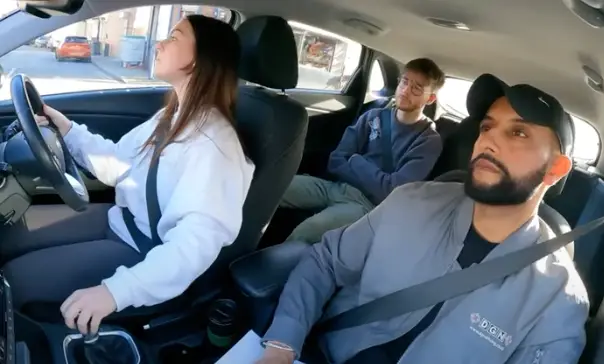 The driver overtakes a bus.