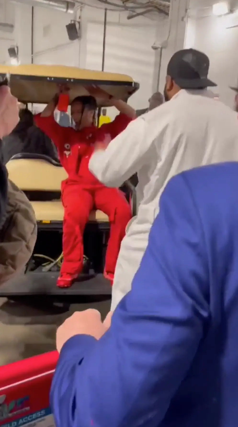 Rihanna and her crew celebrating backstage at the Super Bowl.