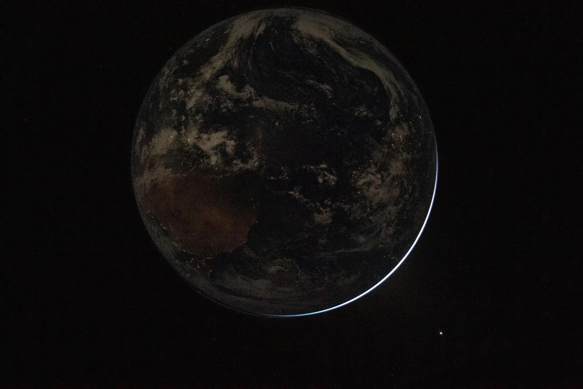 A view of a backlit Earth. (NASA)