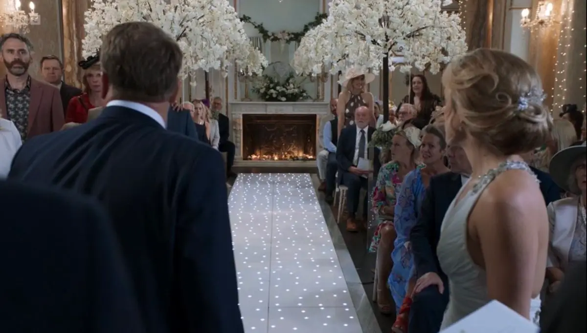 The two extras were so into it. (BBC)