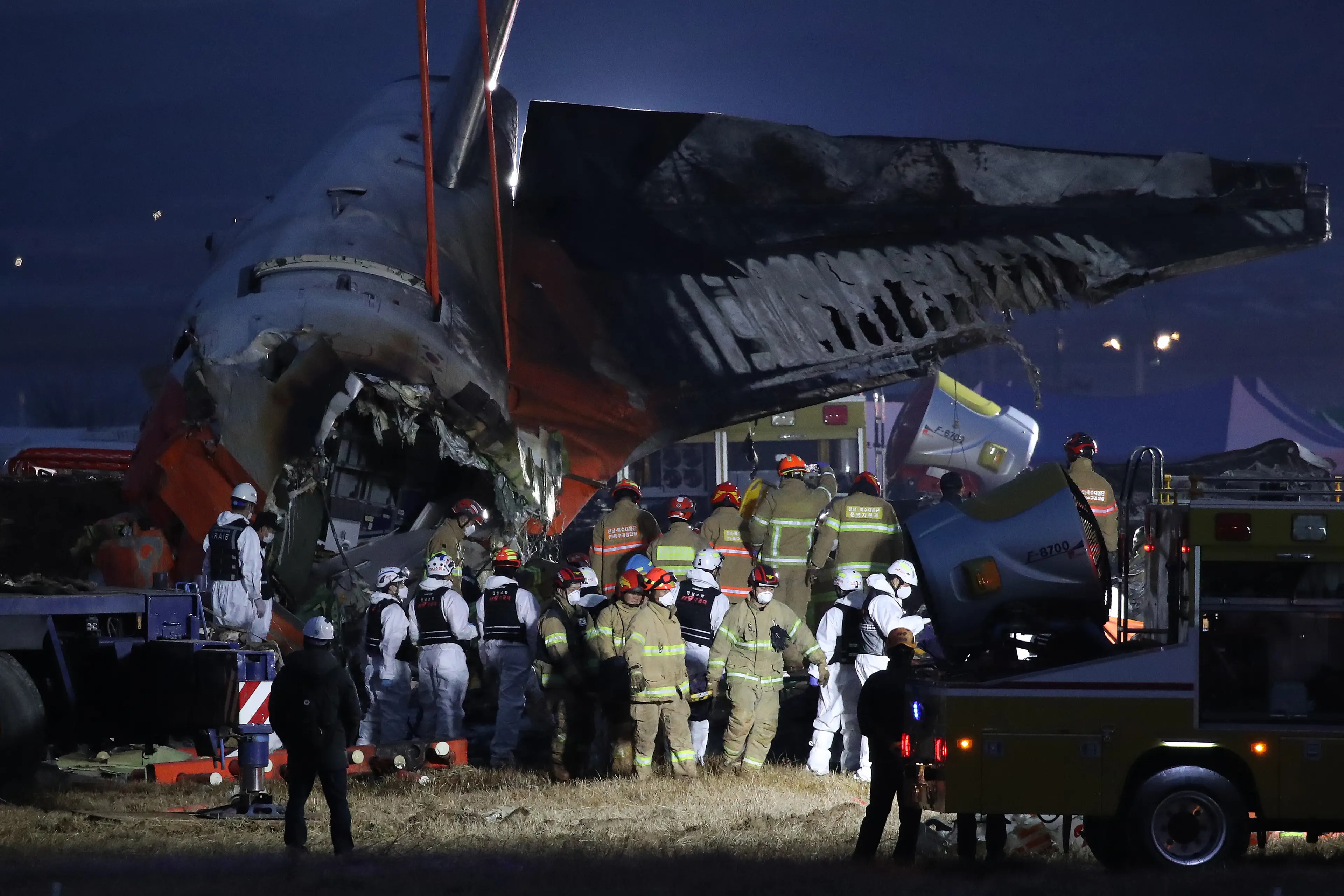 Two crew members were found alive in the wreckage of the plane (Chung Sung-Jun/Getty Images)