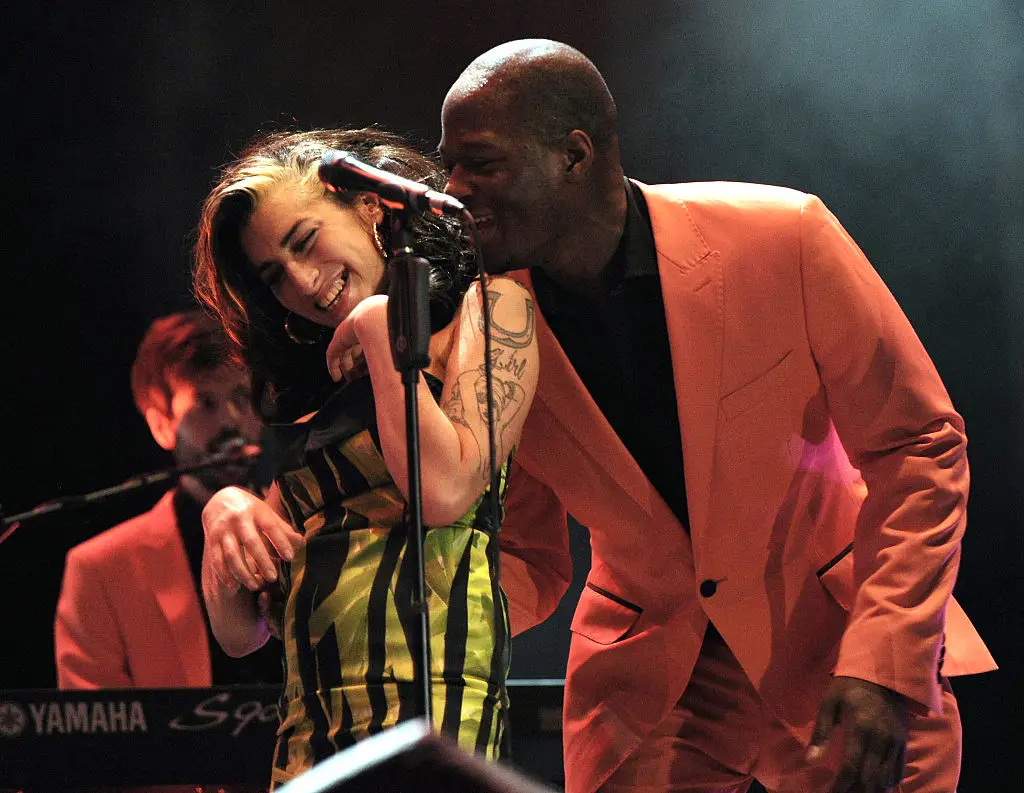 The silk minidress worn by Amy Winehouse in her final performance was sold at auction for $243,200 (Brian Rasic/Getty Images)