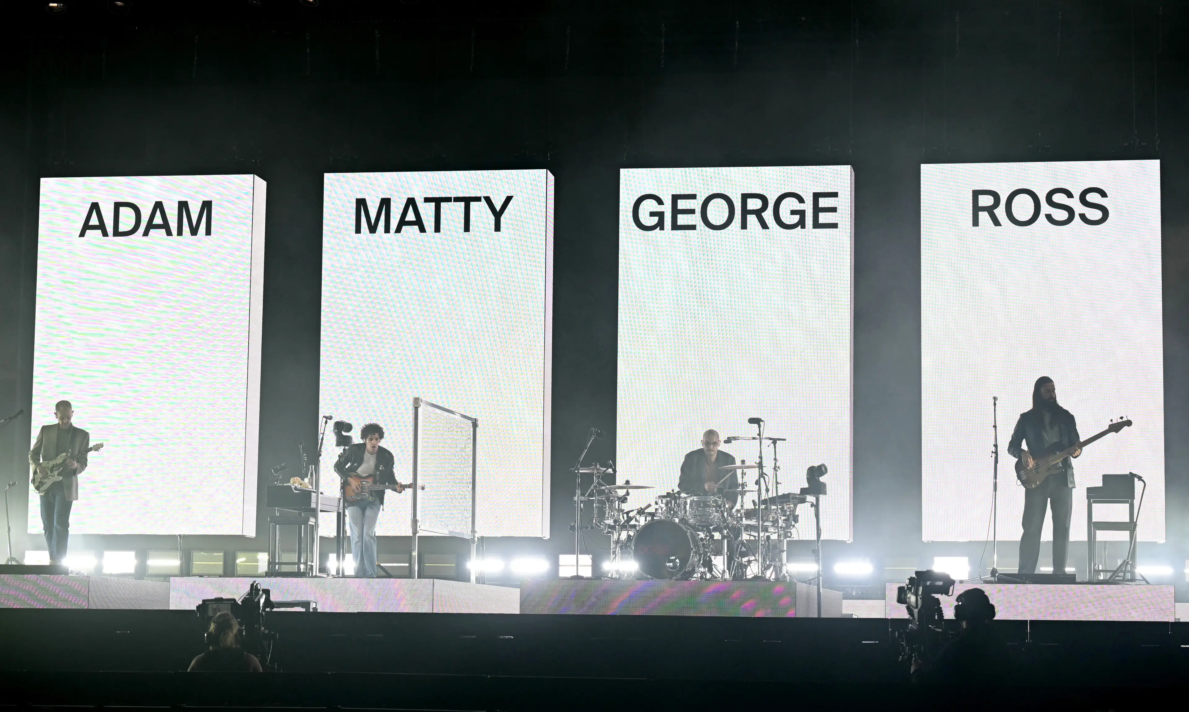 People have been sharing their thoughts about The 1975's headline set on social media (OLI SCARFF/AFP via Getty Images)