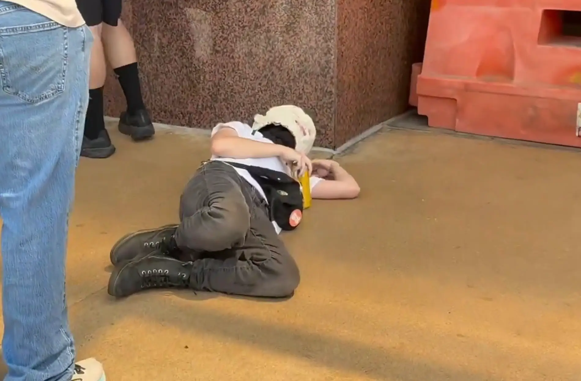 The protestor appeared to mimic the moment that Charlie Kirk was shot dead outside the TPUSA event (X/@FrontlinesTPUSA)