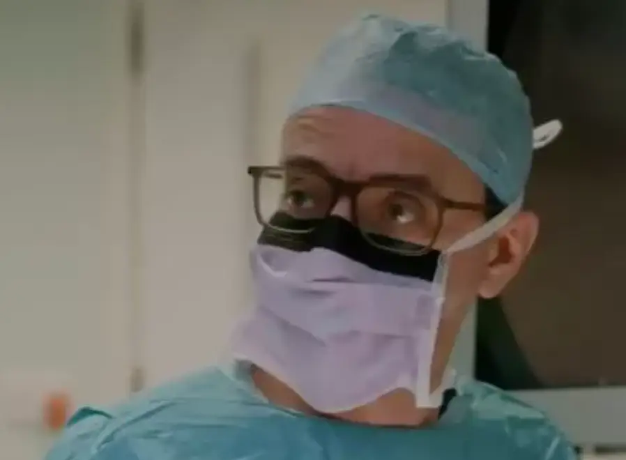 Surgeon Hazim Fallouh conducts Ken's surgery.