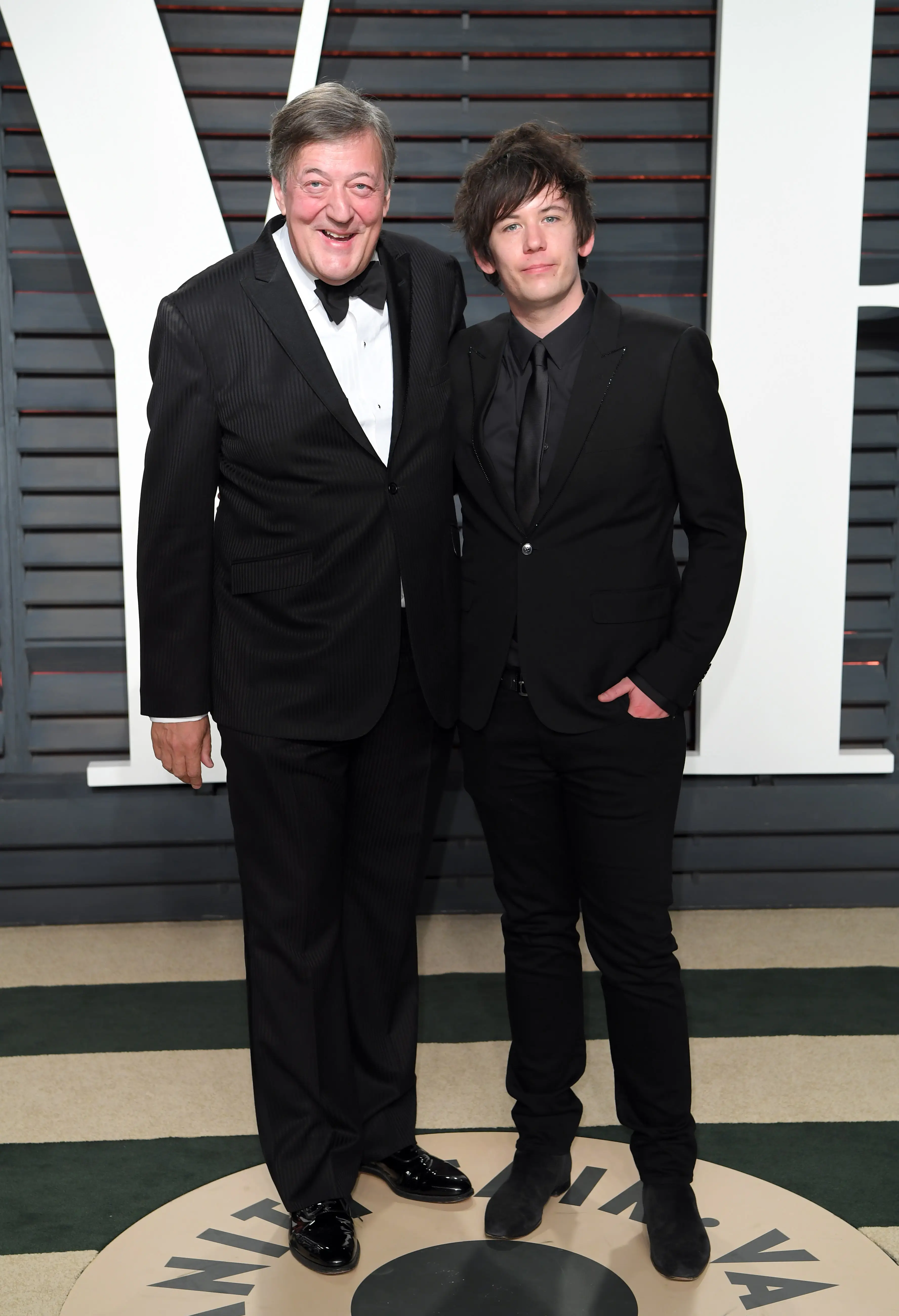Stephen Fry and Elliott Spencer in 2017 (Karwai Tang/Getty Images)