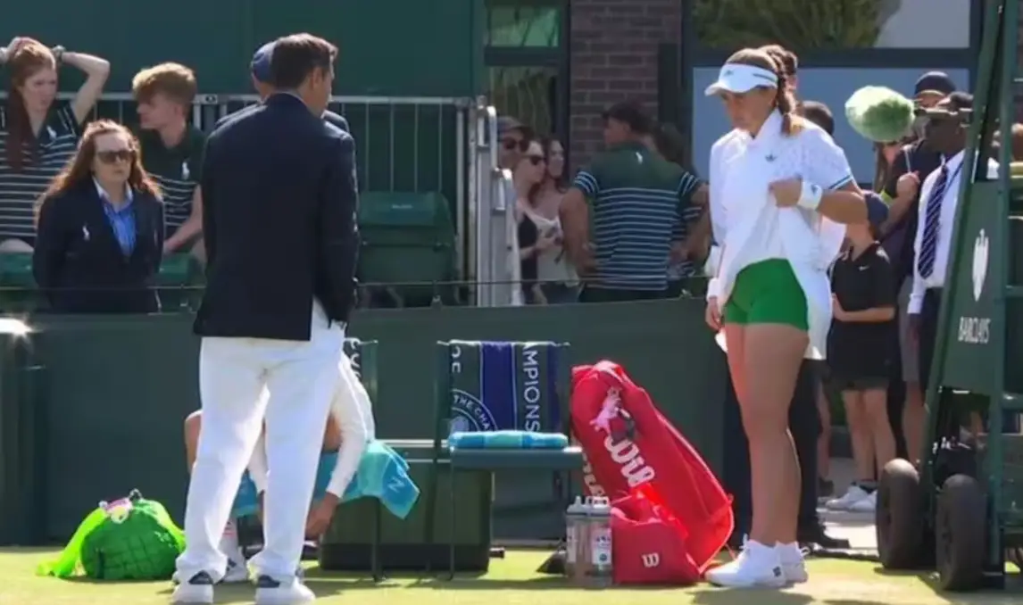 Jelena Ostapenko was seen raising her skirt to reveal her shorts at Wimbledon on Friday (Eurosport)