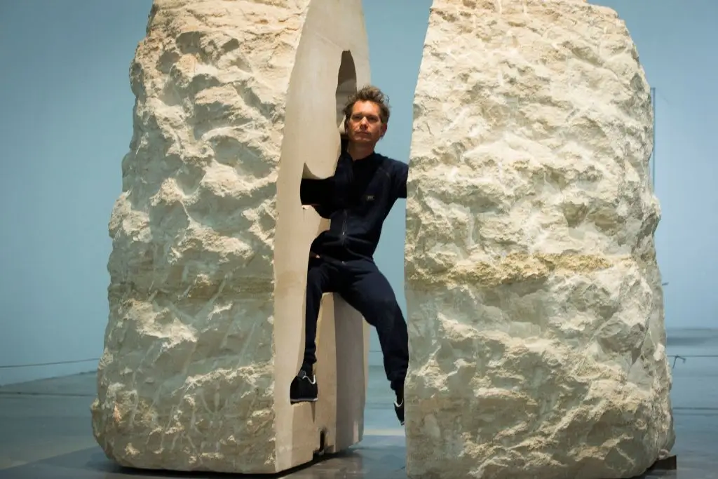 Abraham Poincheval spent an entire week sealed inside a giant limestone rock at a museum in Paris in 2017 (JOEL SAGET/AFP via Getty Images)