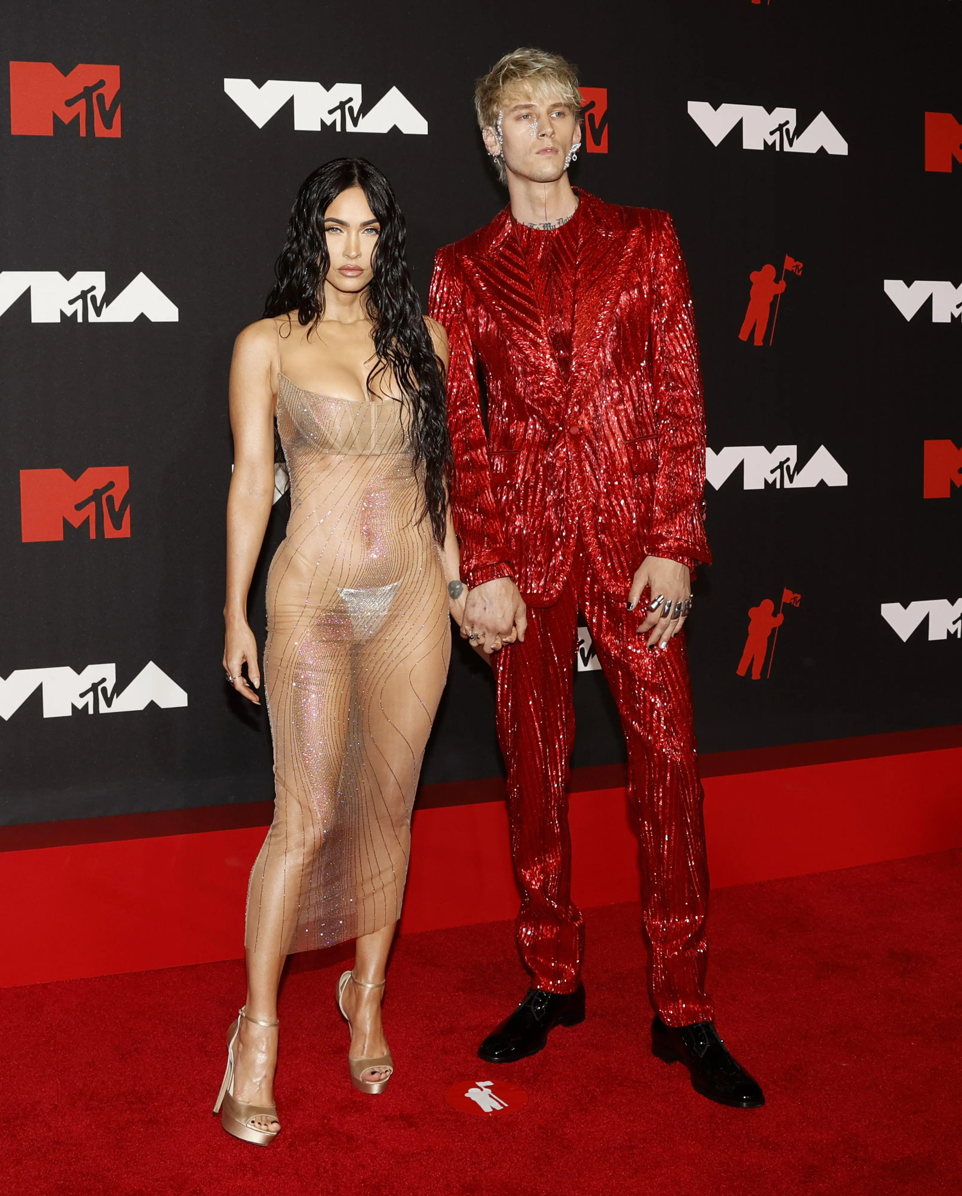 Machine Gun Kelly with Megan Fox.