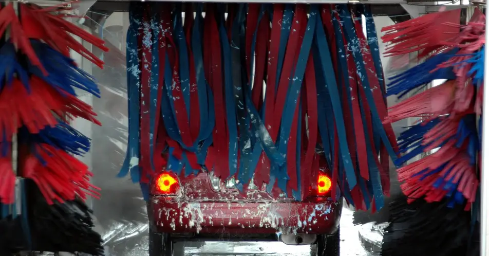 An elderly man was crushed to death while taking his car through a car wash.