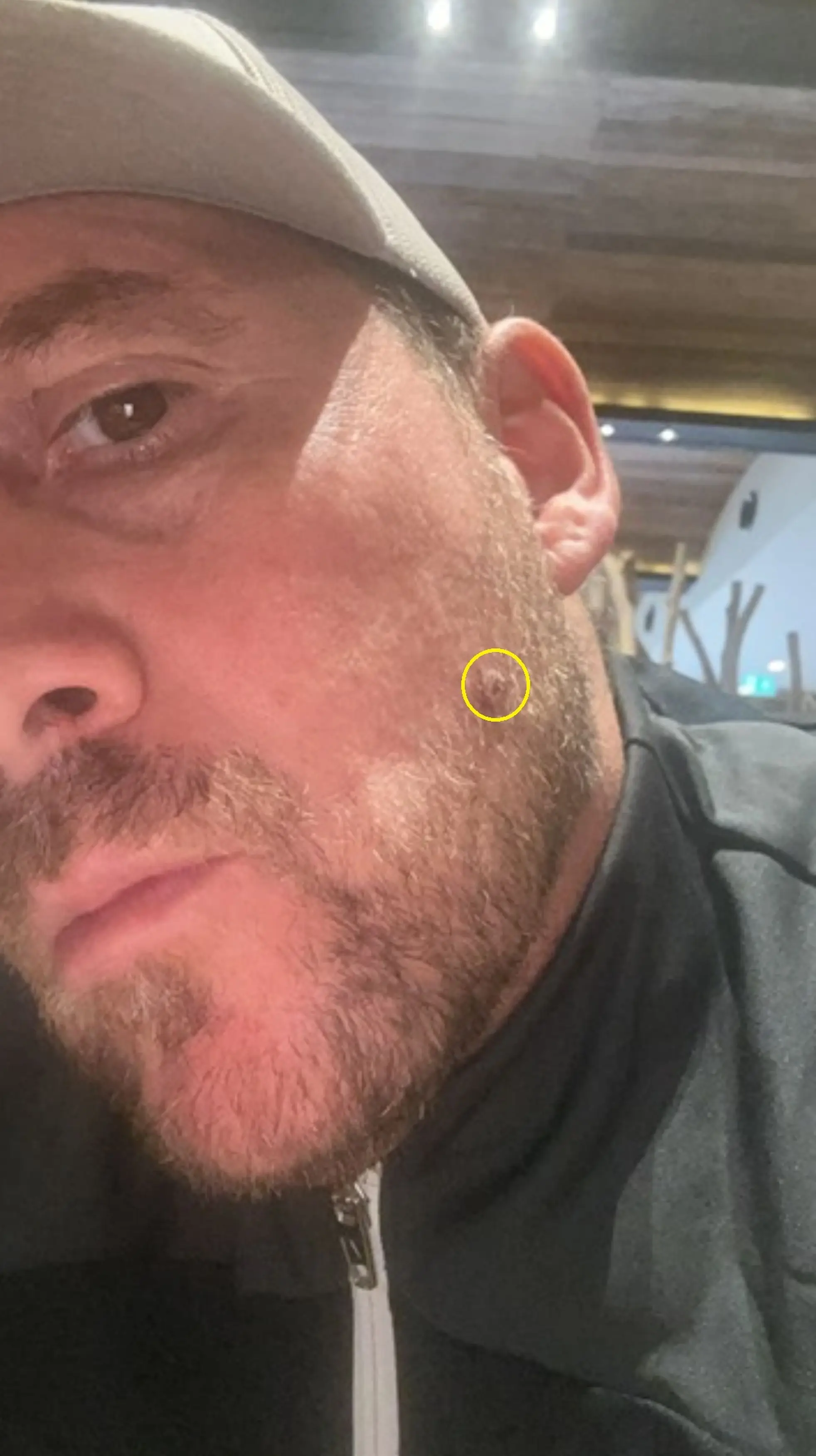 The football manager believes his love of tanning contributed to the growth (Kennedy News and Media)